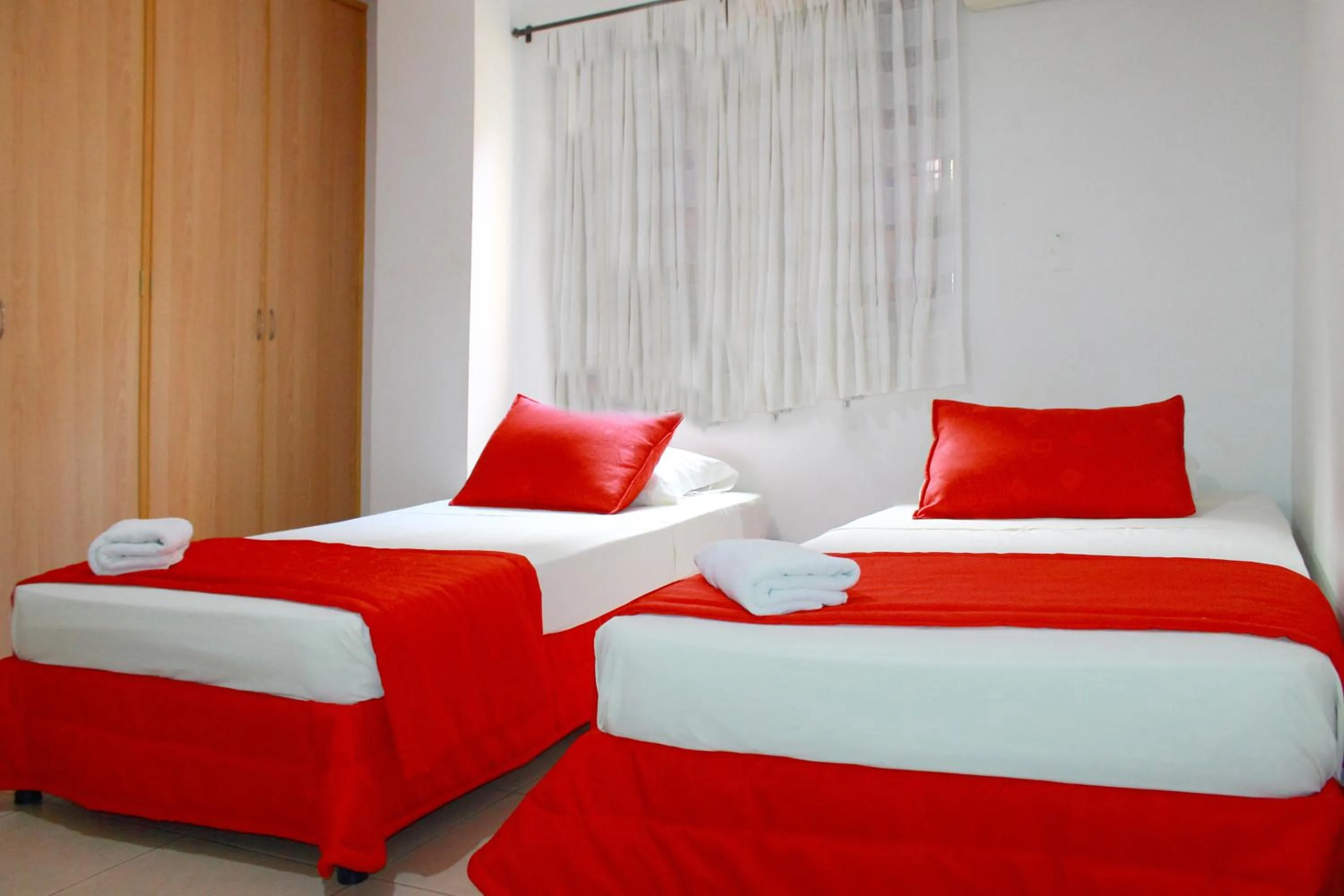 Bed in Apartahotel Los Cerezos