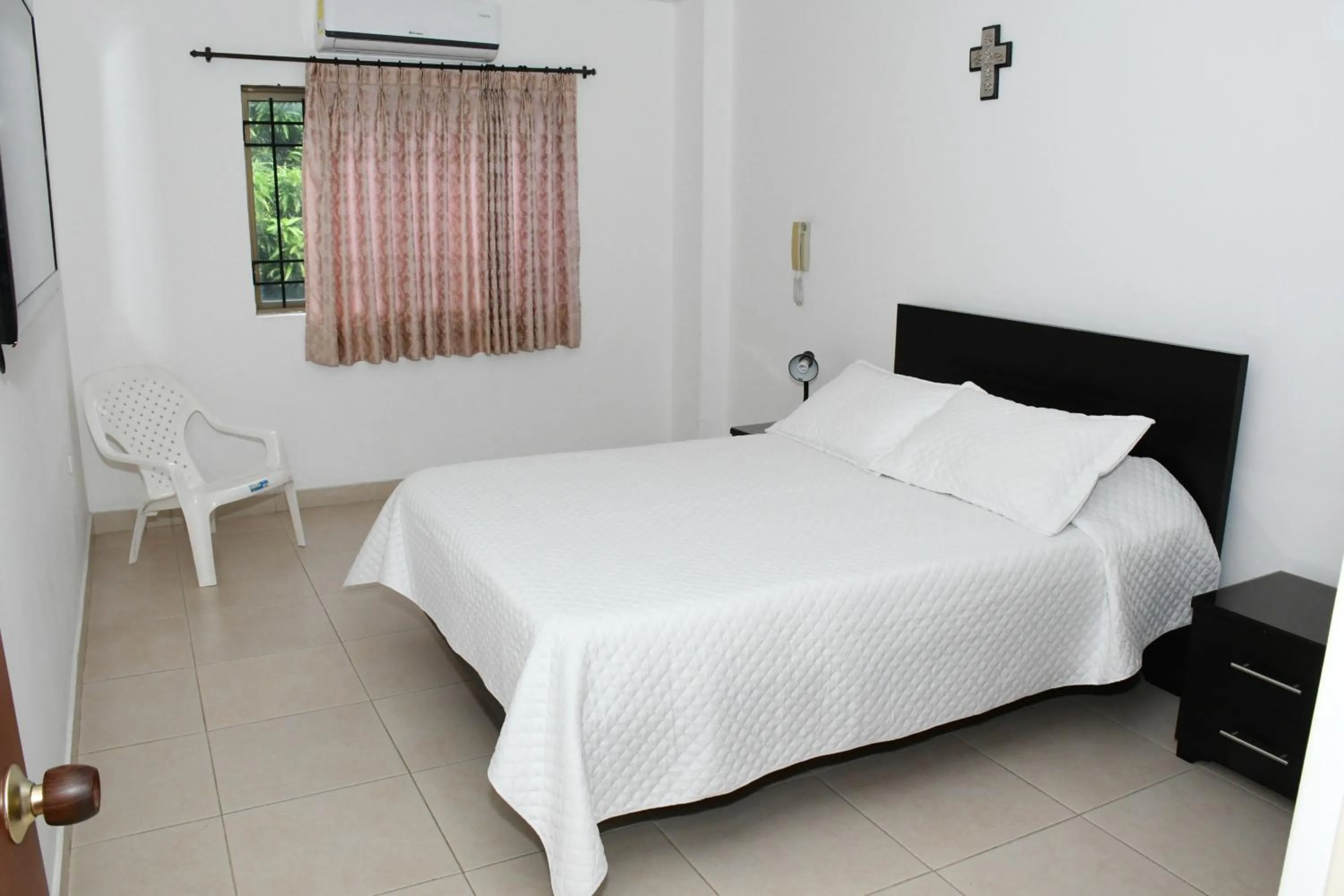Bed in Apartahotel Los Cerezos
