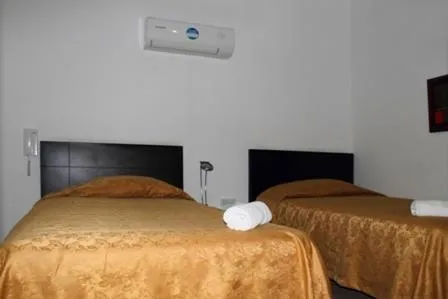 Bed in Apartahotel Los Cerezos