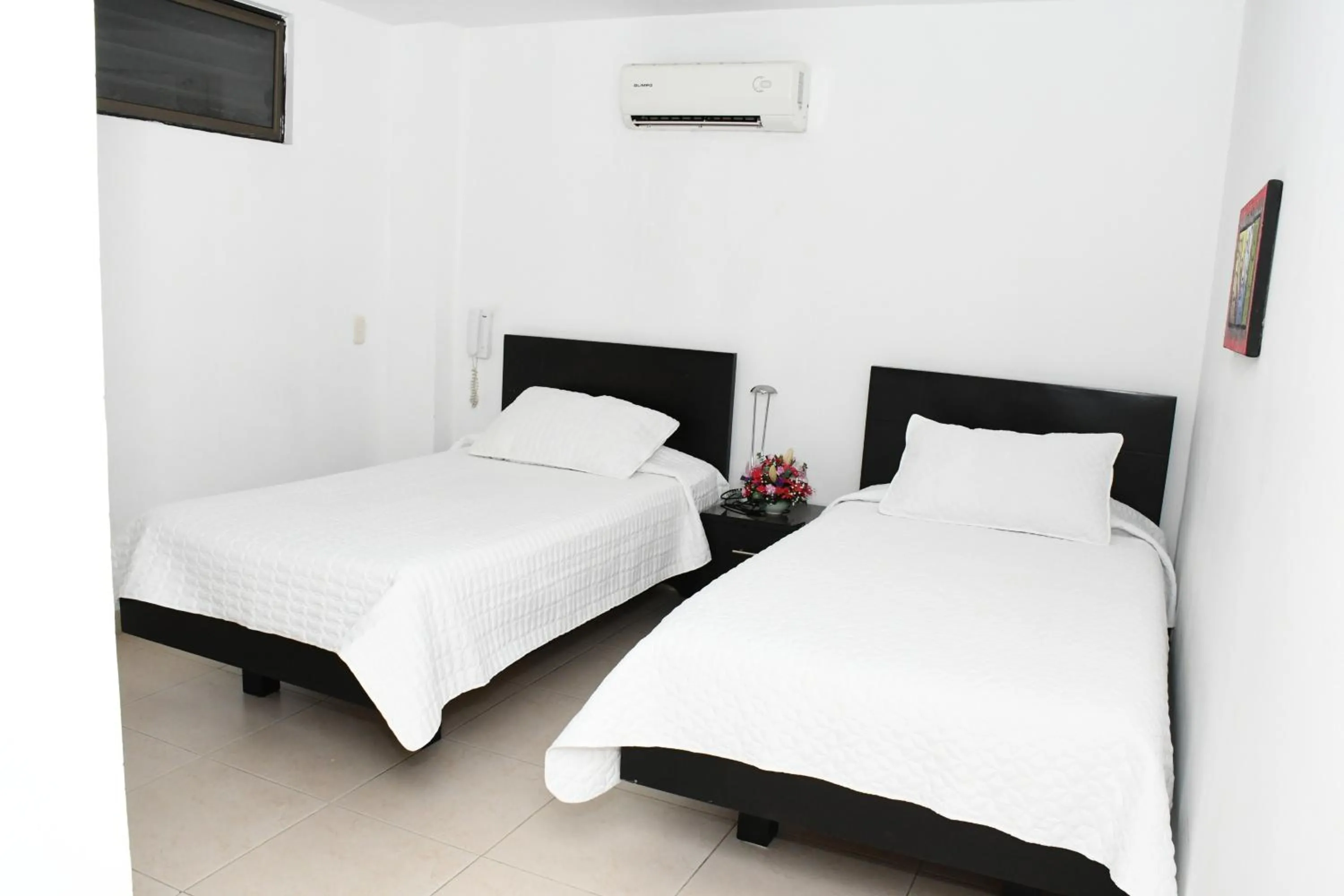Bed in Apartahotel Los Cerezos