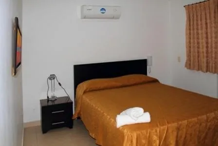 Bed in Apartahotel Los Cerezos