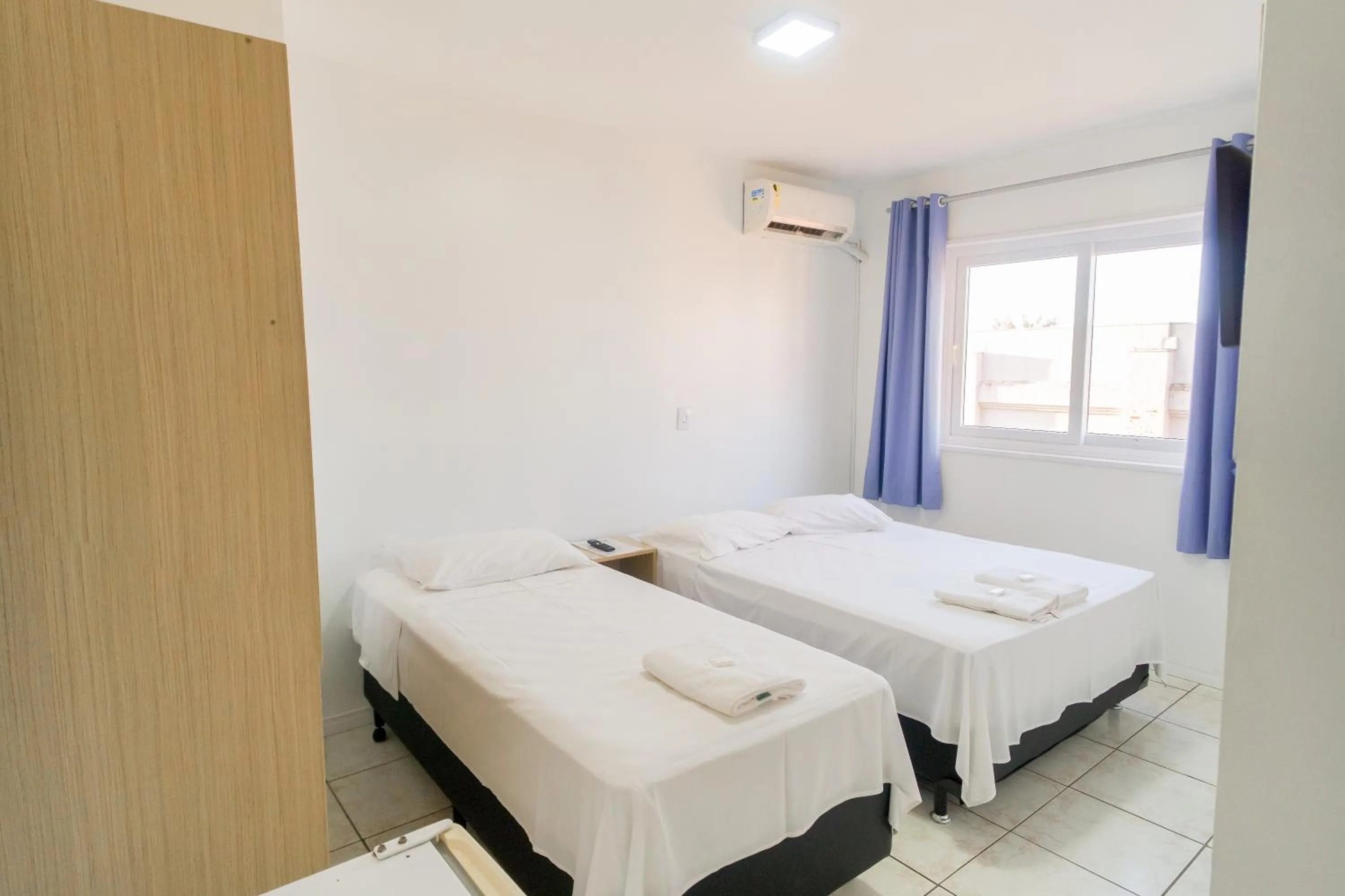 Bed in Xangri-La Praia Hotel