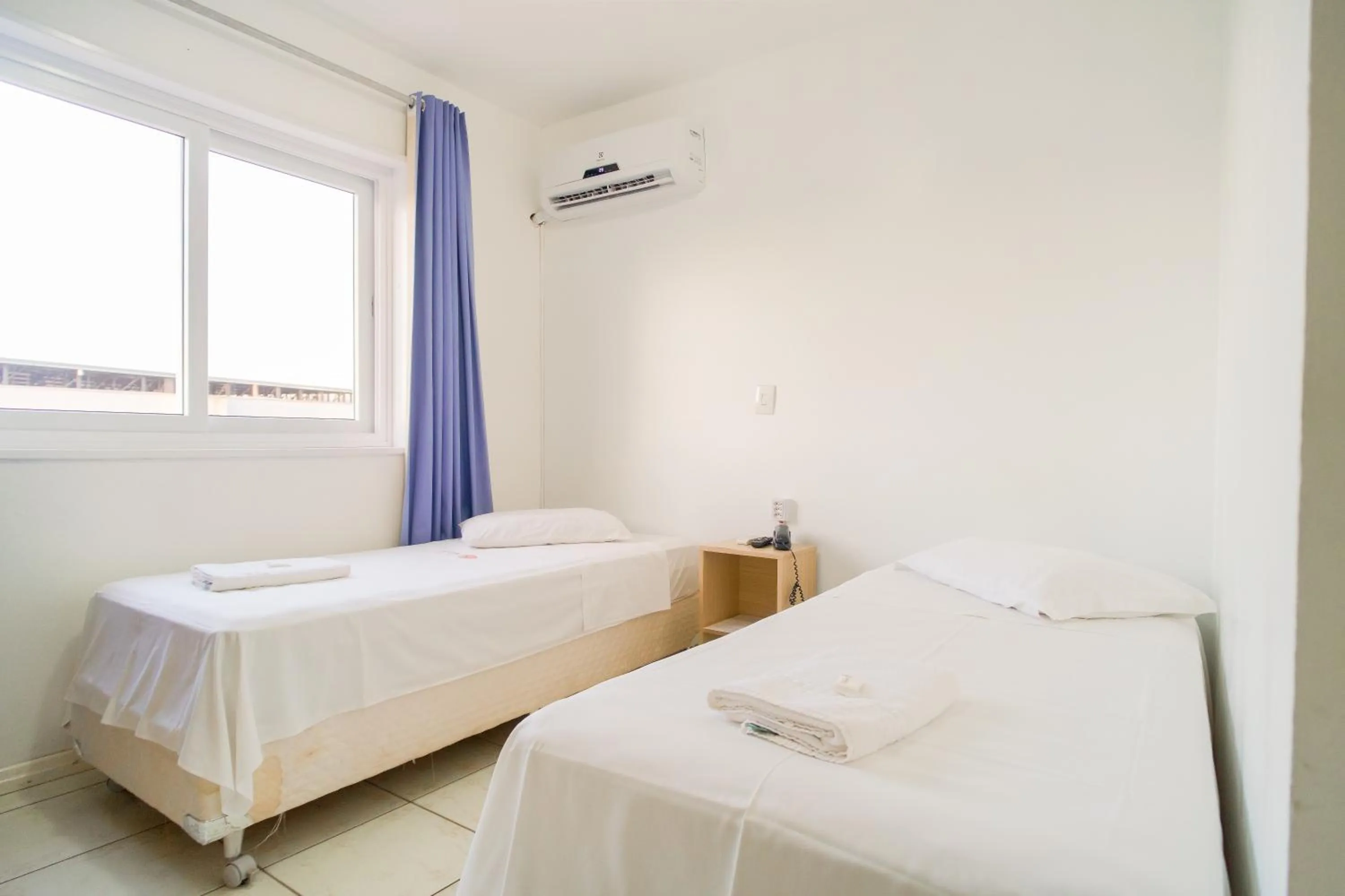 Bed in Xangri-La Praia Hotel