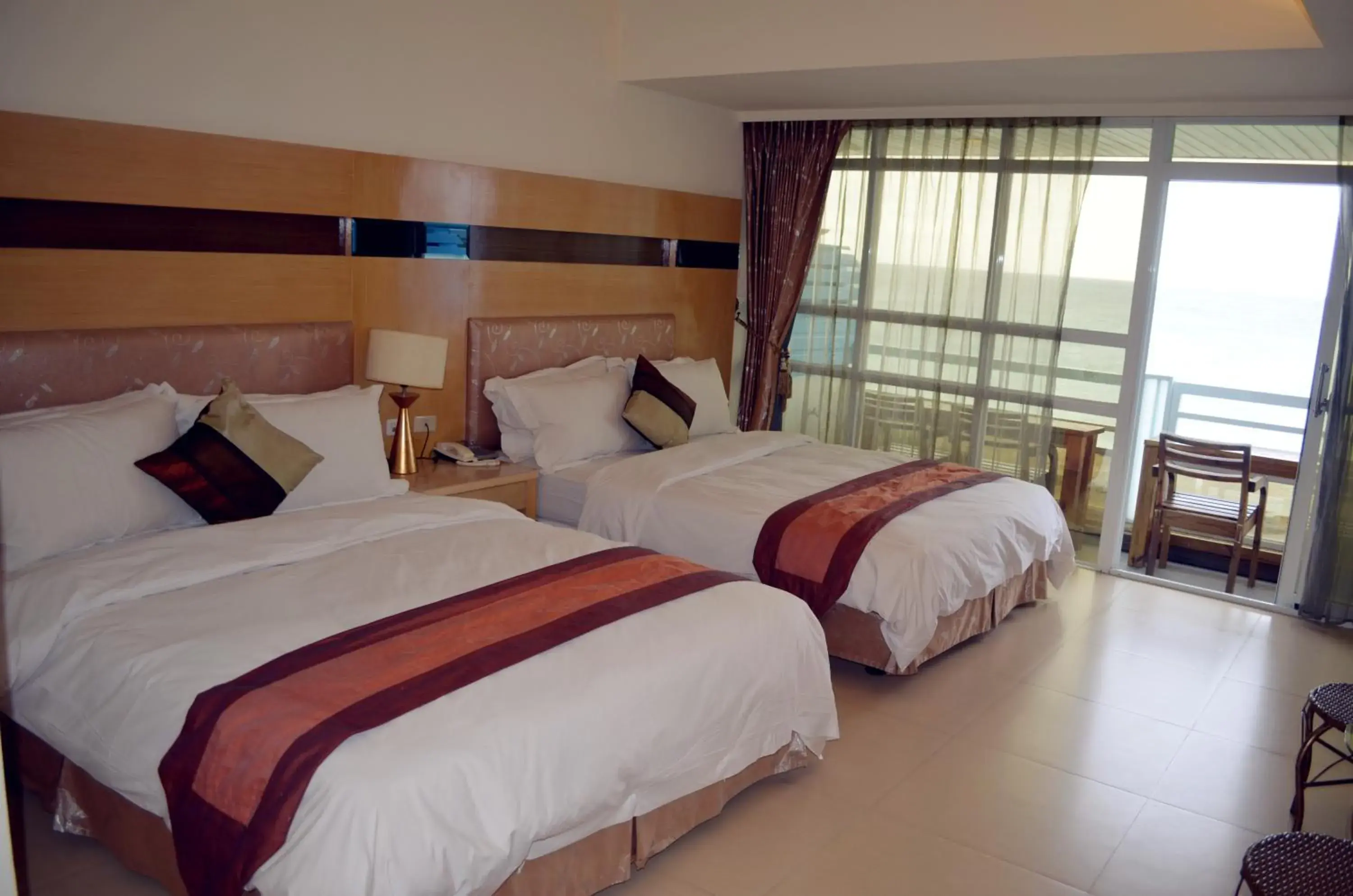 Quadruple Room with Balcony and Sea View in Yake Homestay Quadruple Room with Balcony and Sea View in Yake Homestay