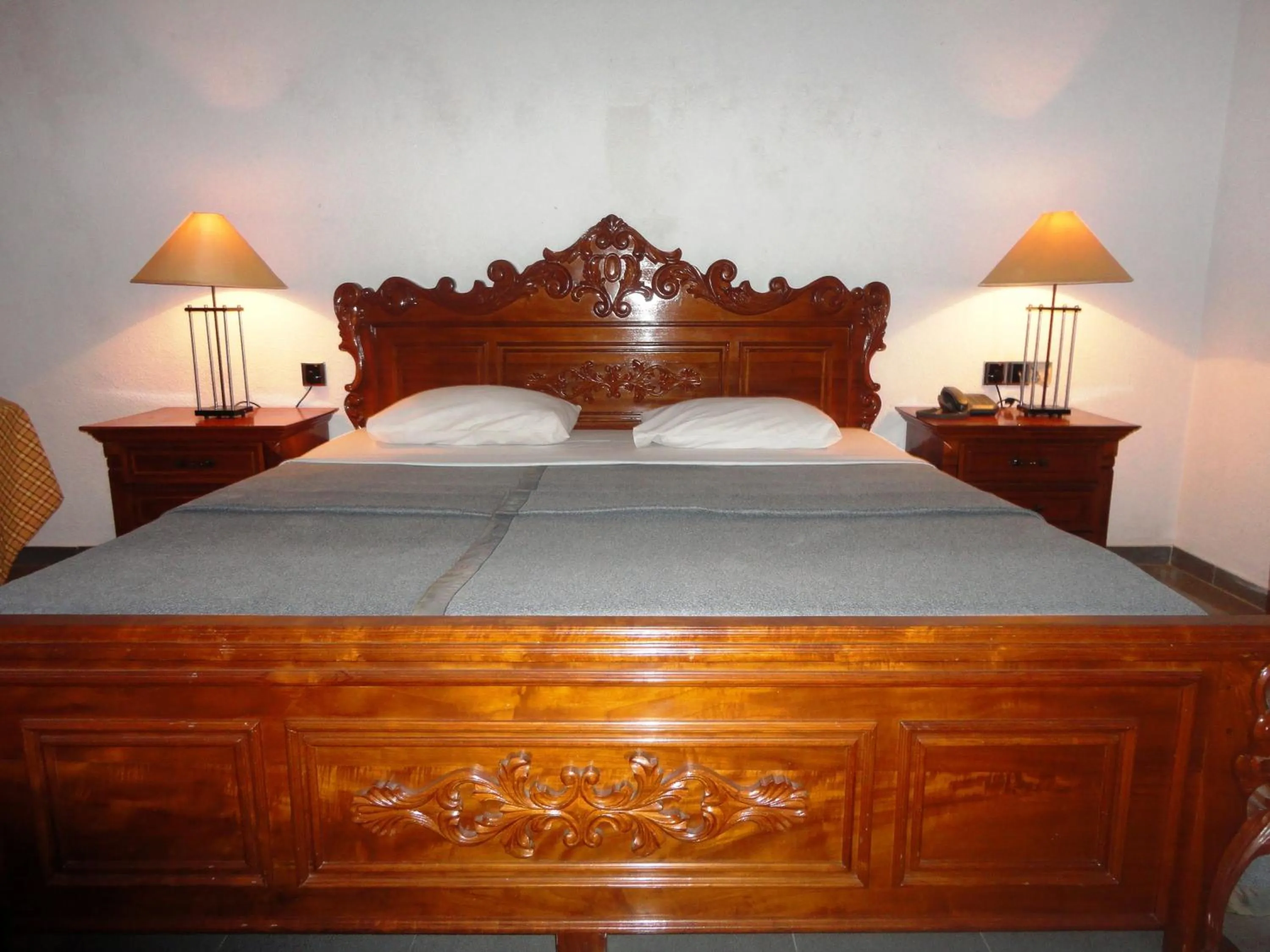 Bed in Hotel Country Comfort