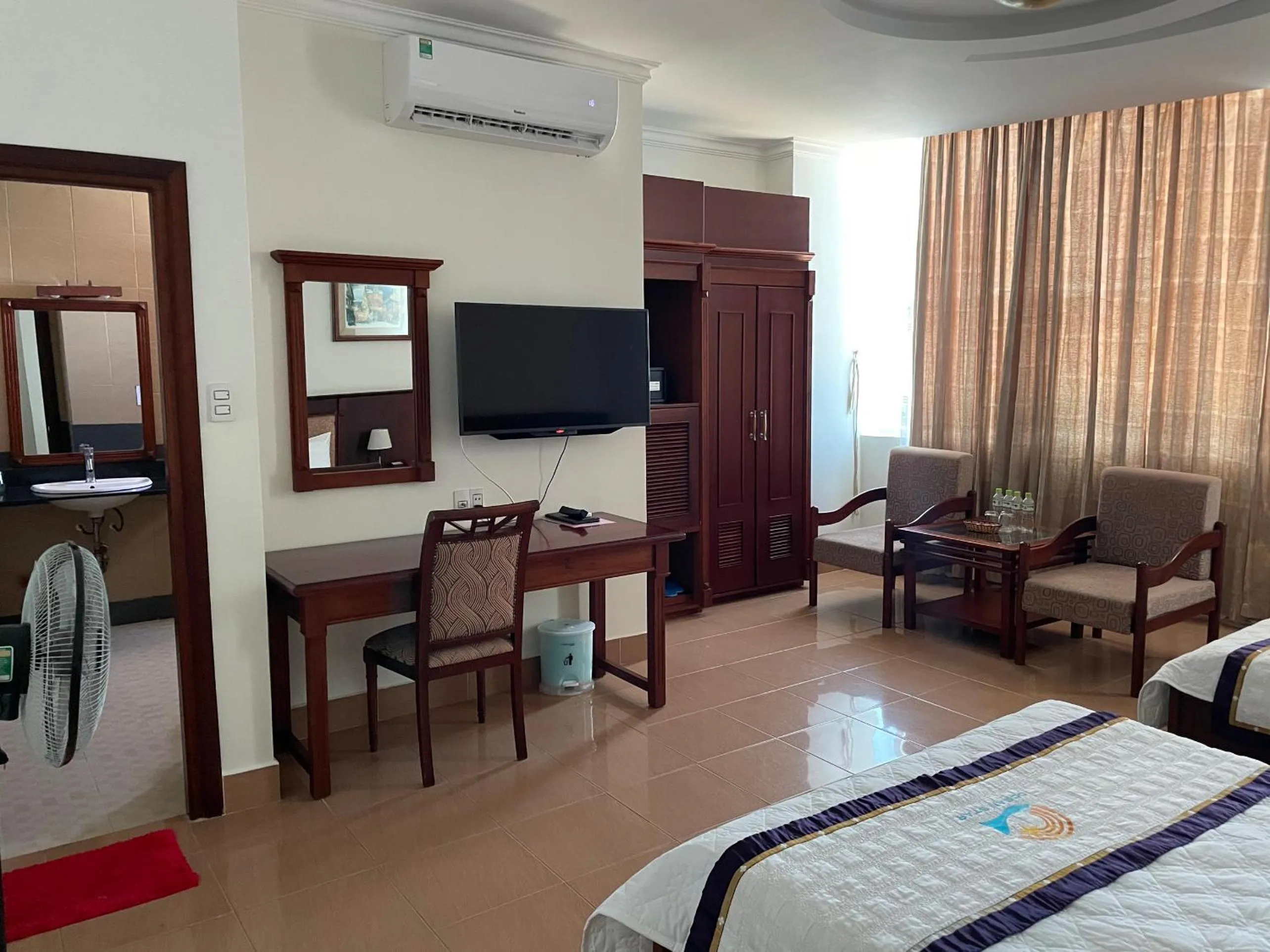 Bed in Ocean Star Hotel