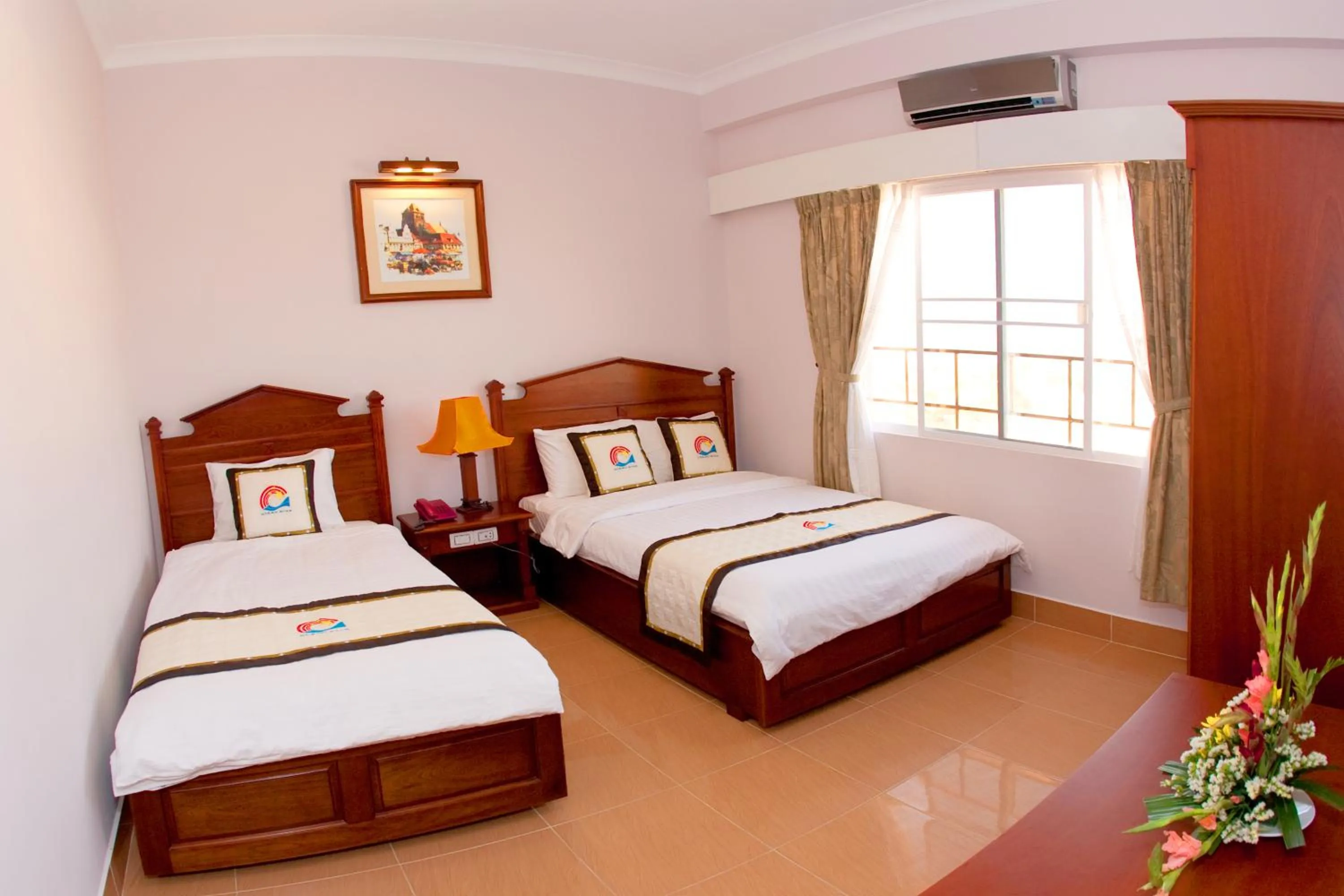 Bed in Ocean Star Hotel