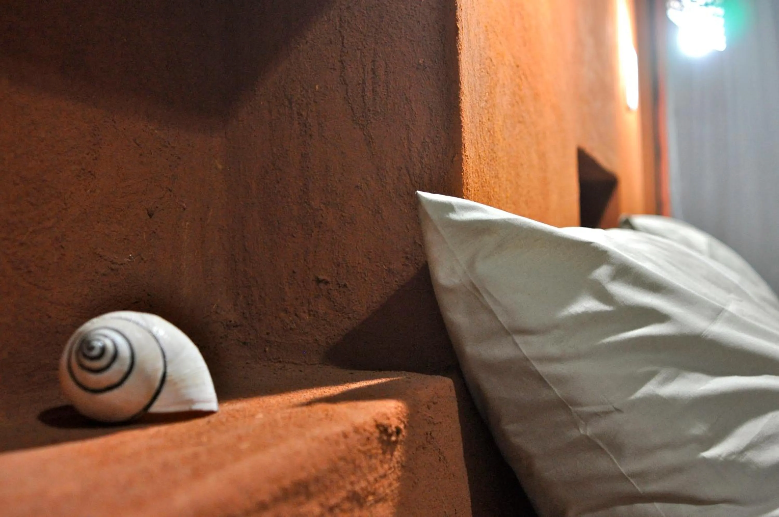 Decorative detail, Bed in Munga Eco-Lodge