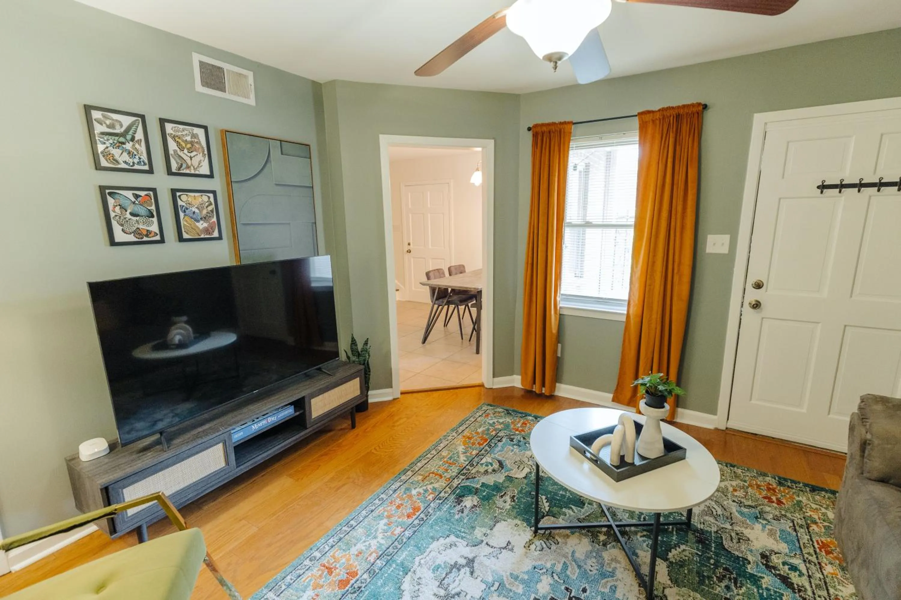 Living room in Centrally Located 2BR Overton Square Unit 1 Fast WiFi Free Parking Yes Pets