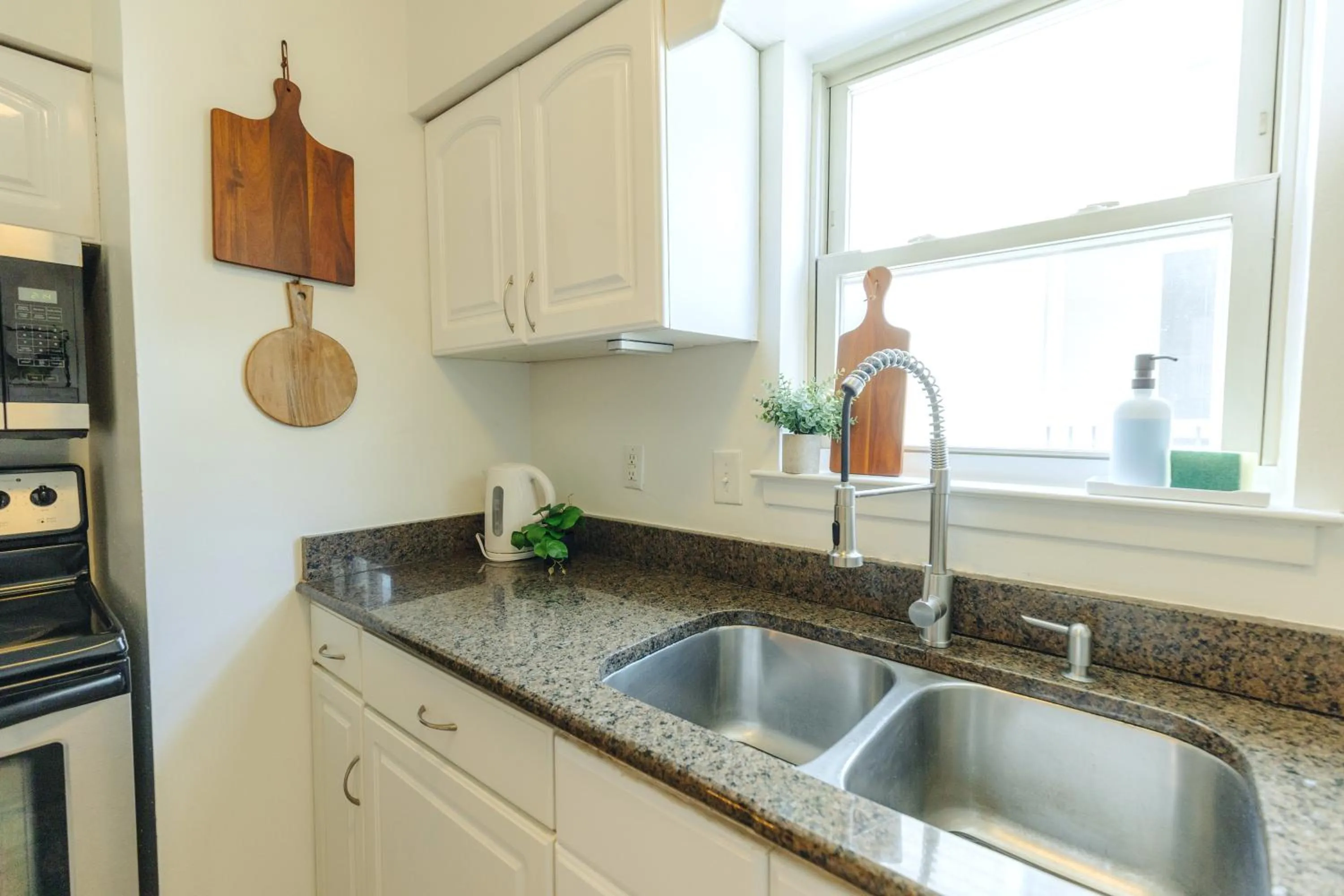 Kitchen or kitchenette in Centrally Located 2BR Overton Square Unit 1 Fast WiFi Free Parking Yes Pets