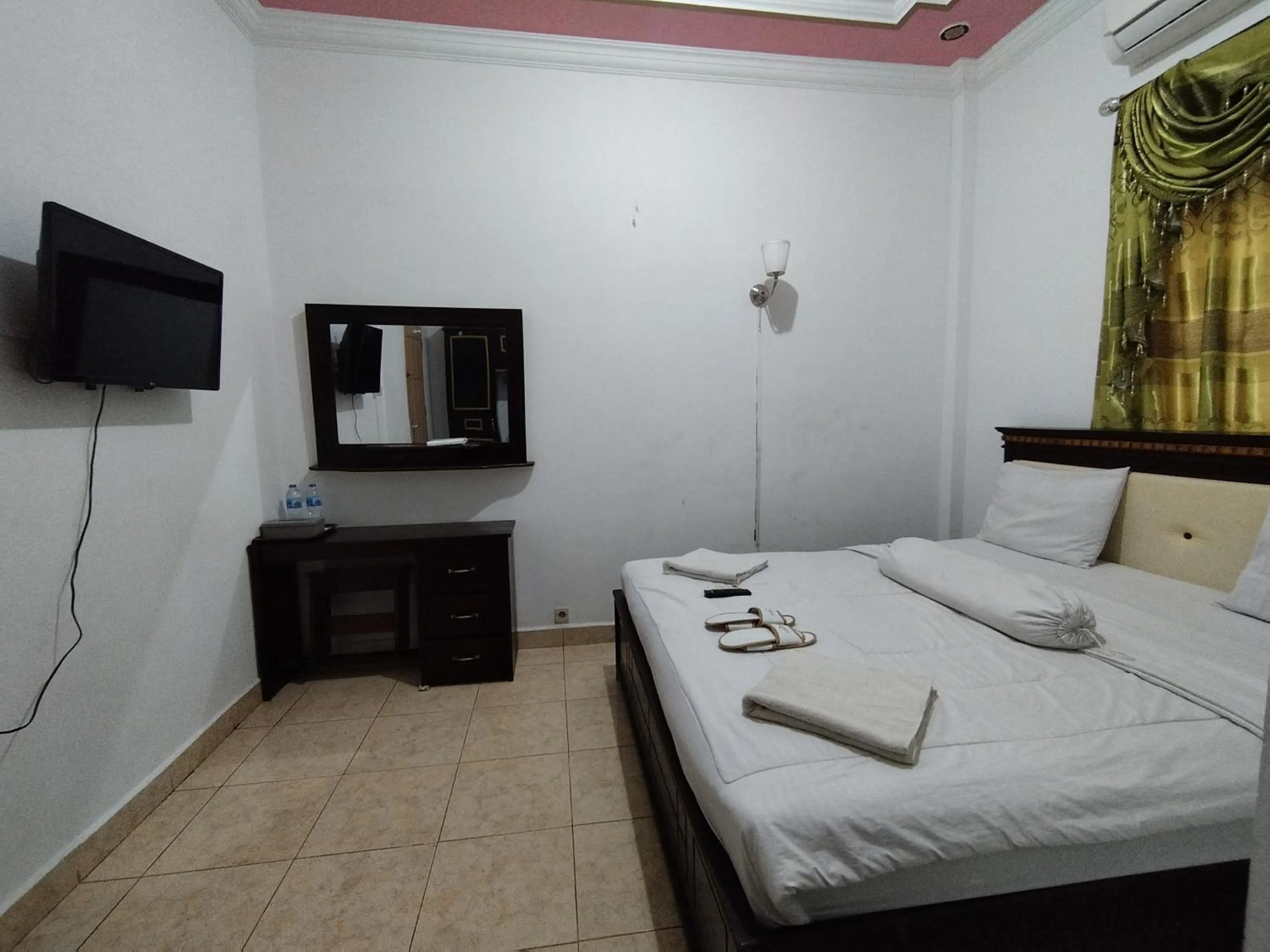 Bedroom in Hotel O My Kost Syariah