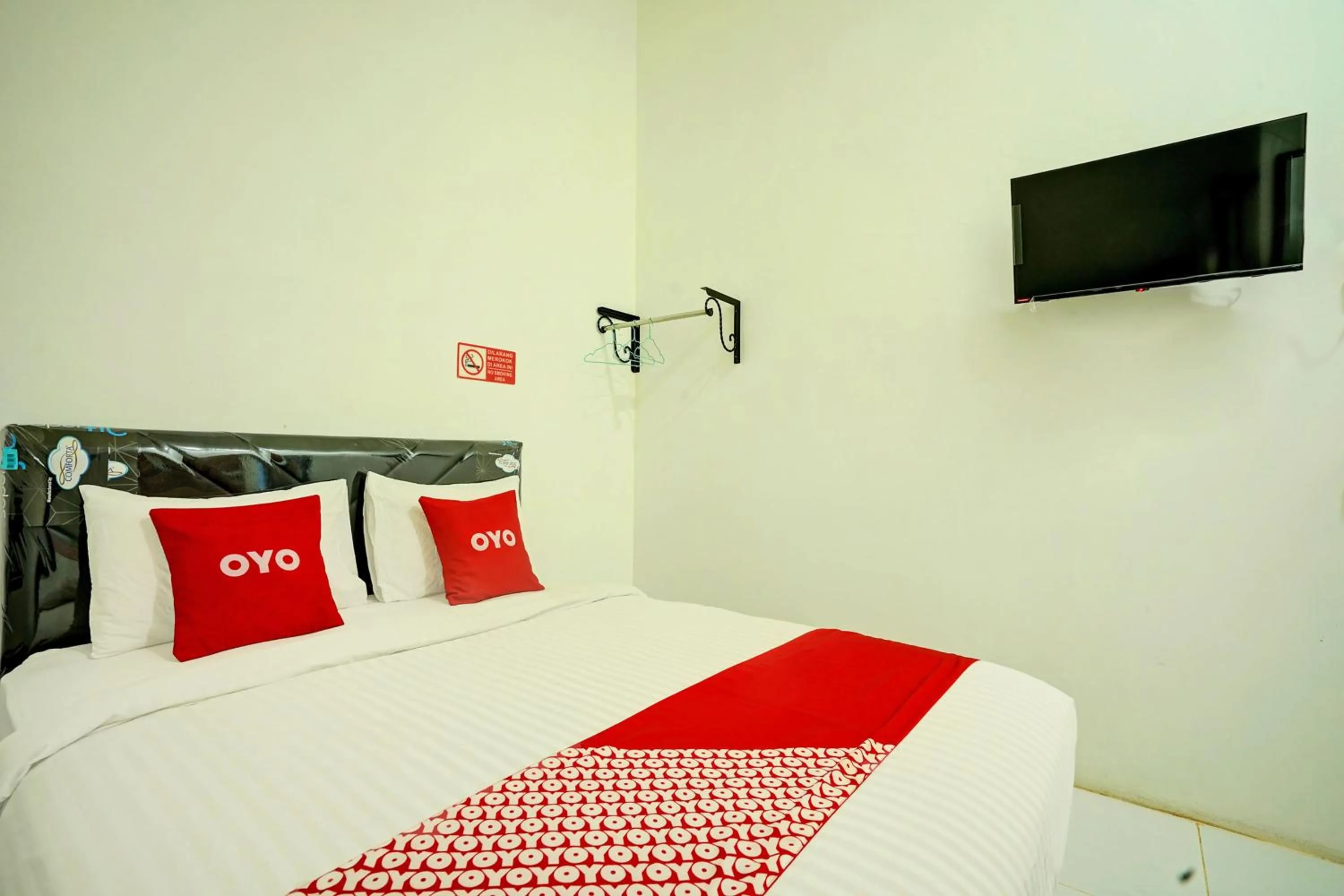 Bedroom in OYO 92700 D' Ngalau Residence Syariah