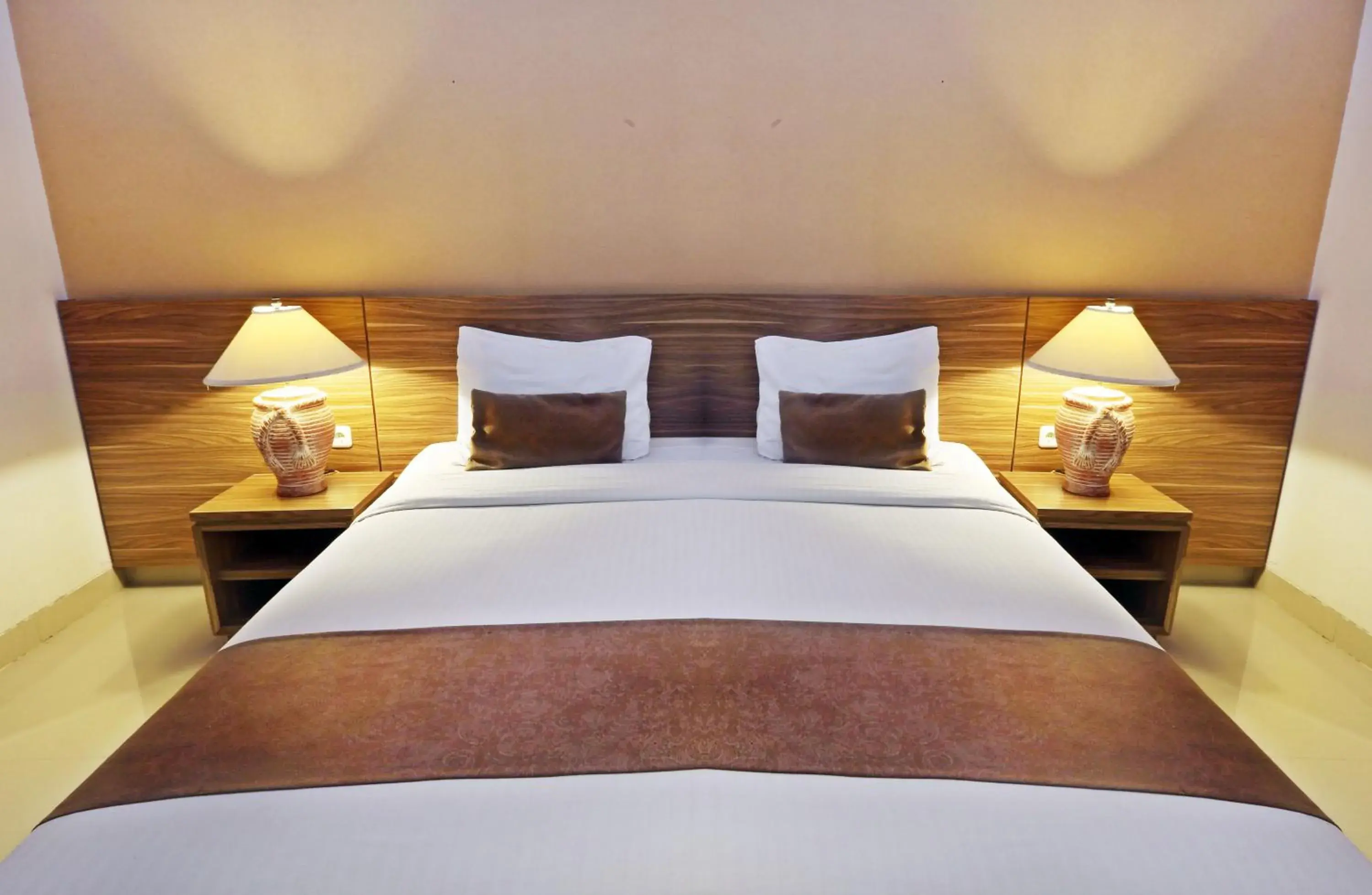 Bed in Lorin Dwangsa Solo Hotel Bed in Lorin Dwangsa Solo Hotel