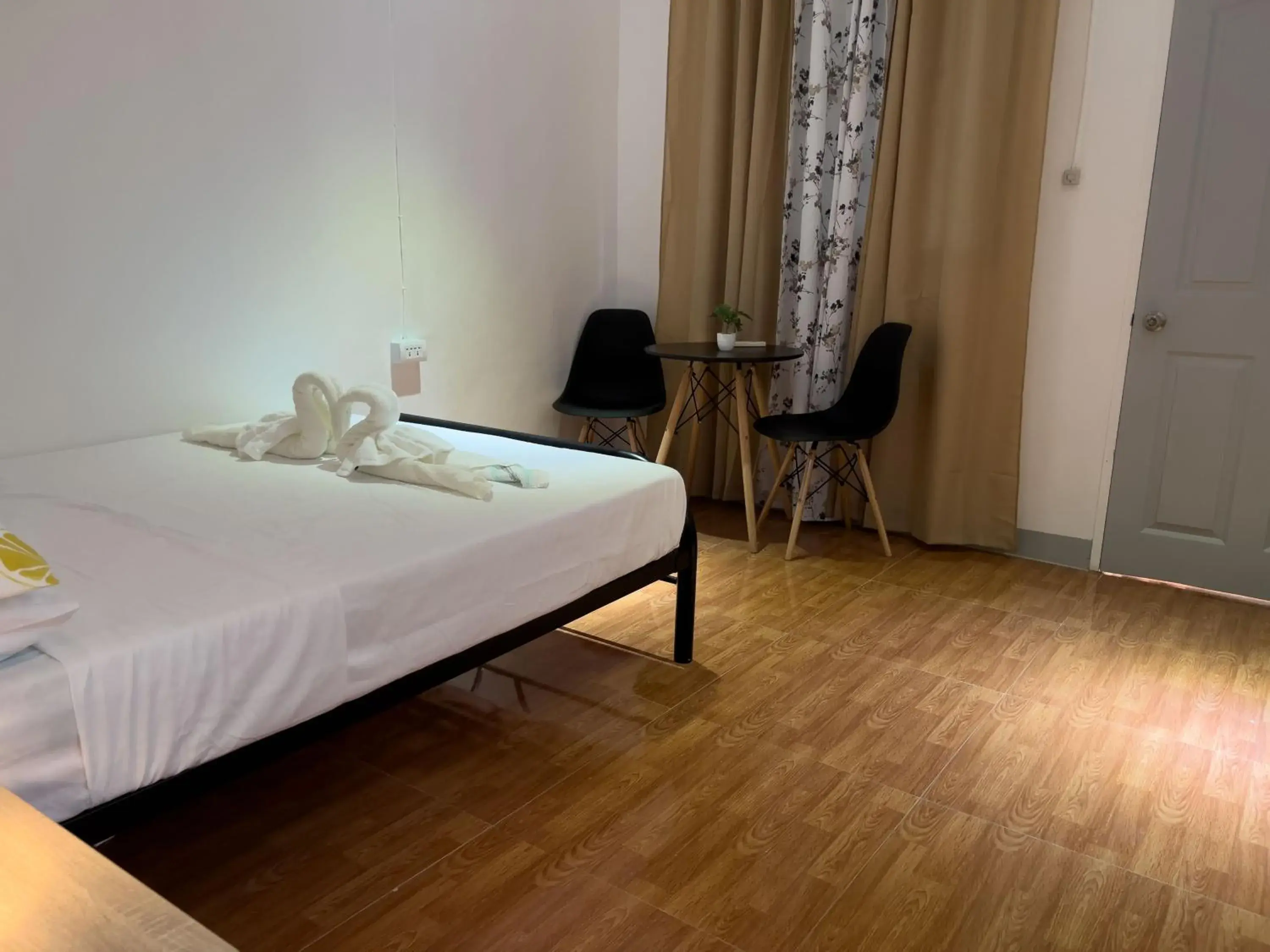 Seating area, Bed in The Backyard Inn Seating area, Bed in The Backyard Inn