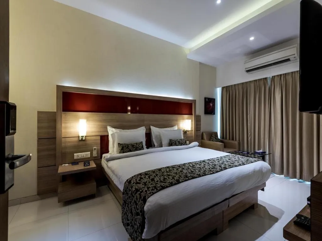 Photo of the whole room, Bed in Galaxy Beacon Hotel, Santacruz ,Mumbai