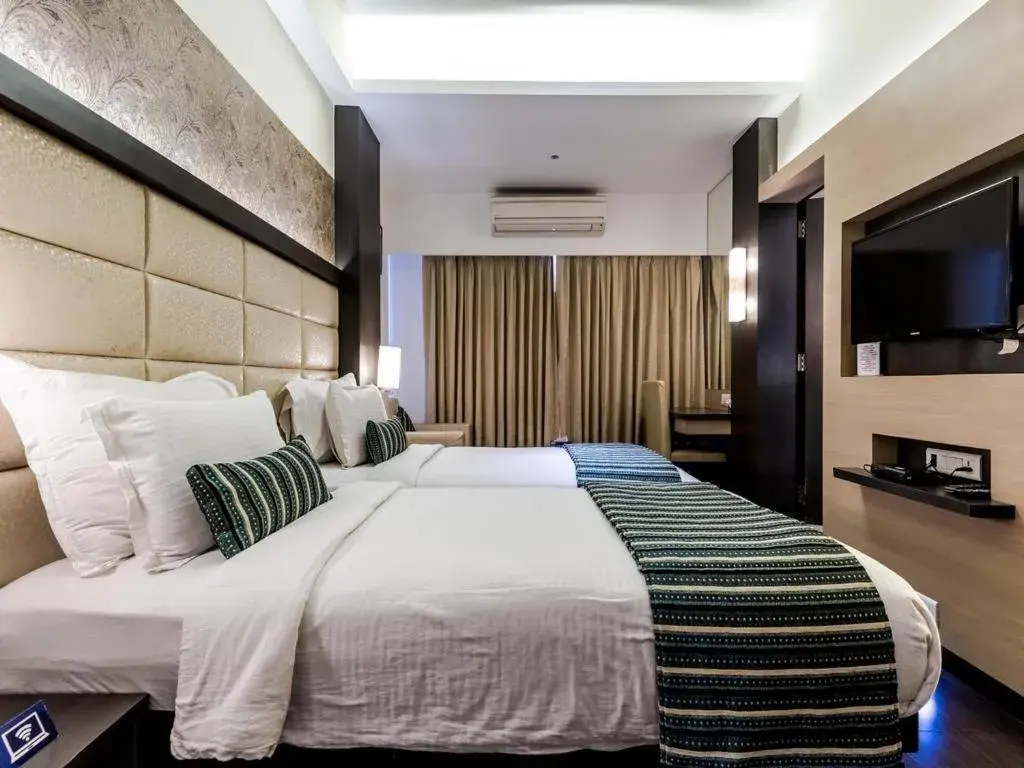 Photo of the whole room, Bed in Galaxy Beacon Hotel, Santacruz ,Mumbai Photo of the whole room, Bed in Galaxy Beacon Hotel, Santacruz ,Mumbai