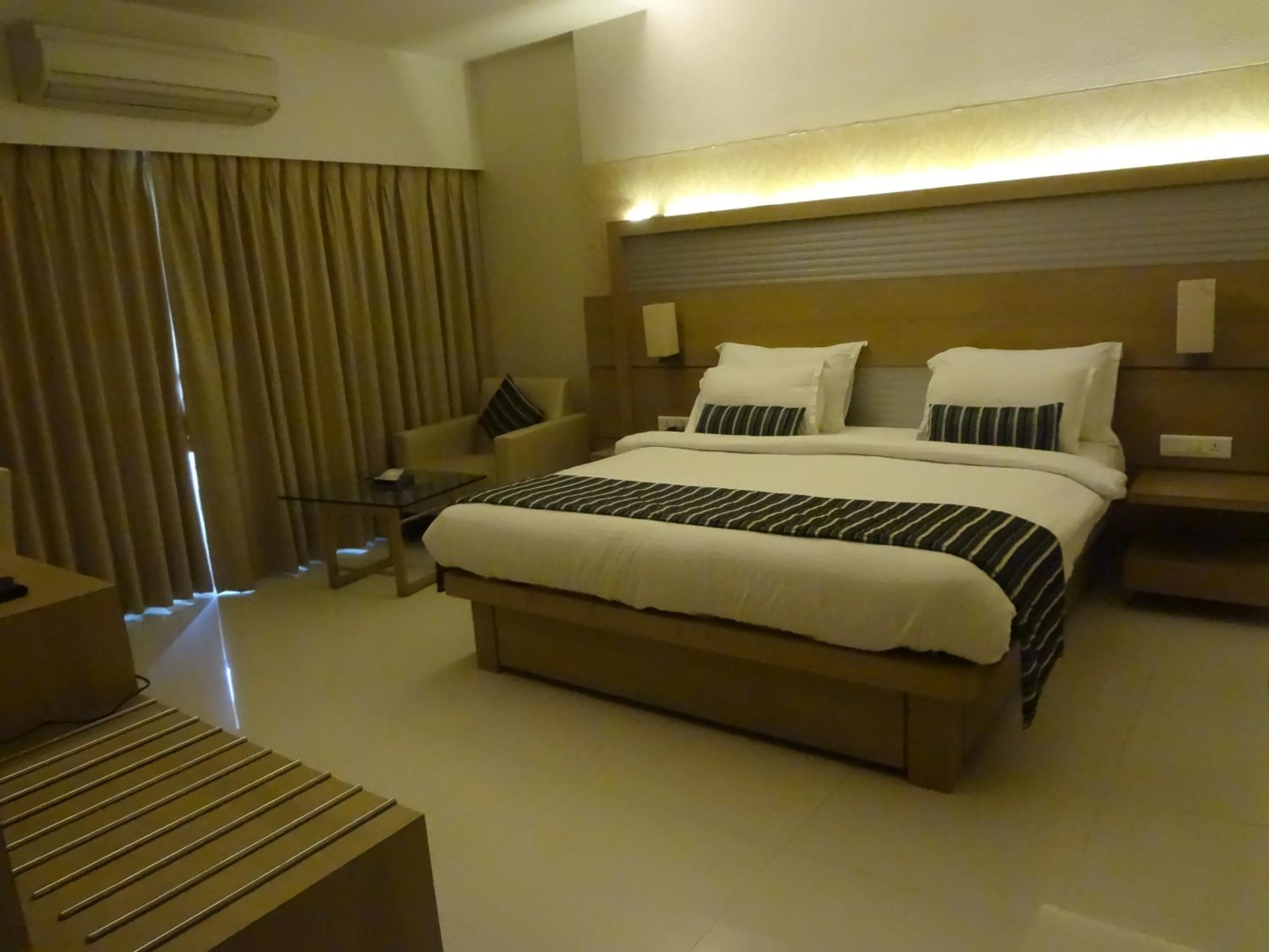 Bedroom, Bed in Galaxy Beacon Hotel, Santacruz ,Mumbai