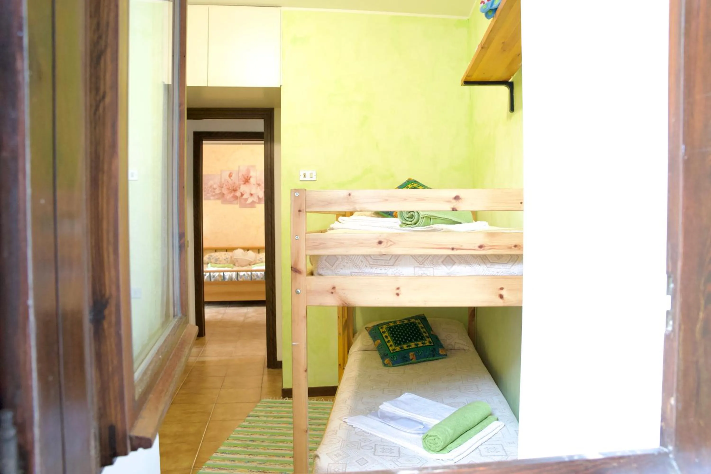 Bedroom, Bed in Hotel Diffuso Il Portichetto sulla collina a Vezio Perledo