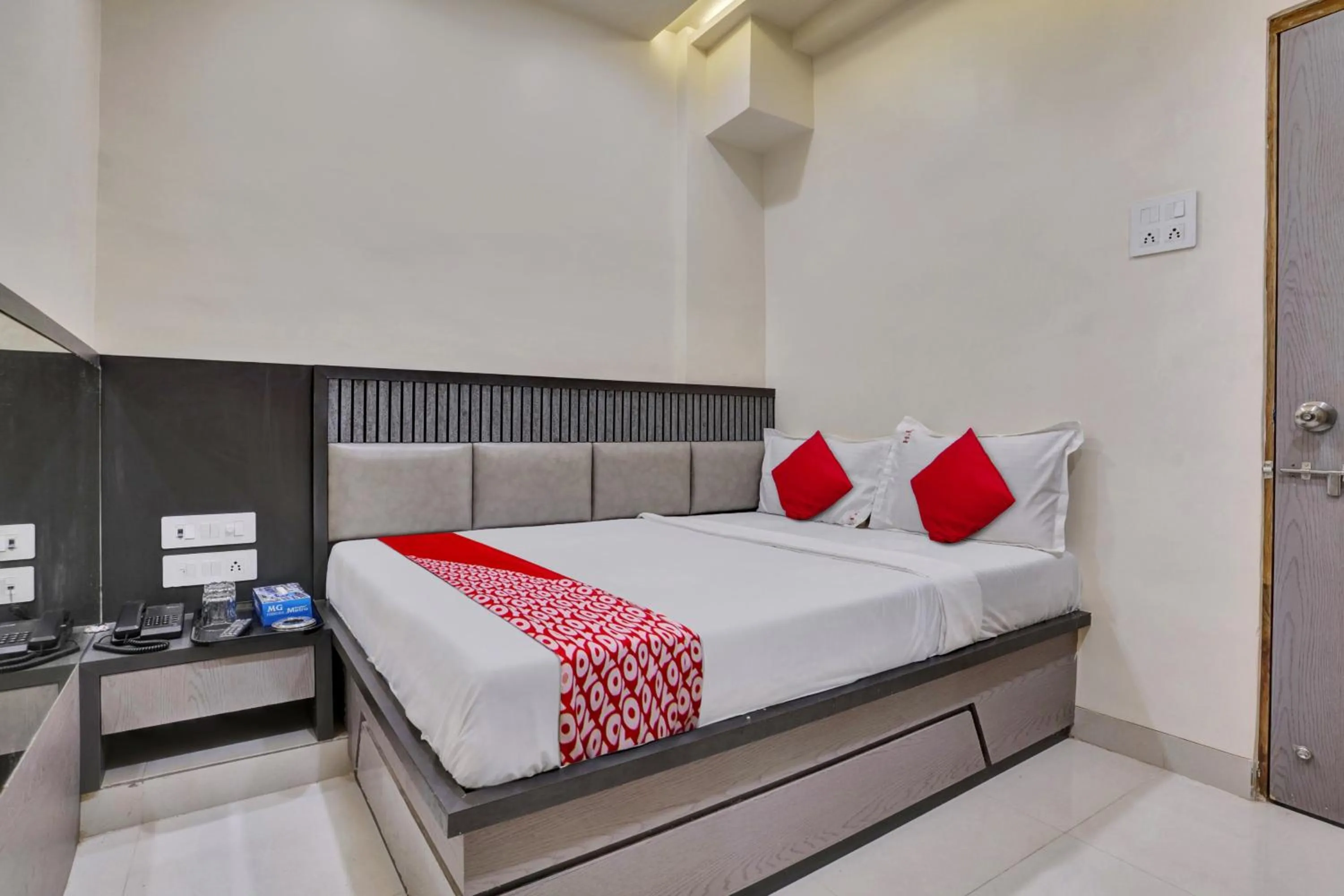 Bedroom in Hotel O Dhiman Residency