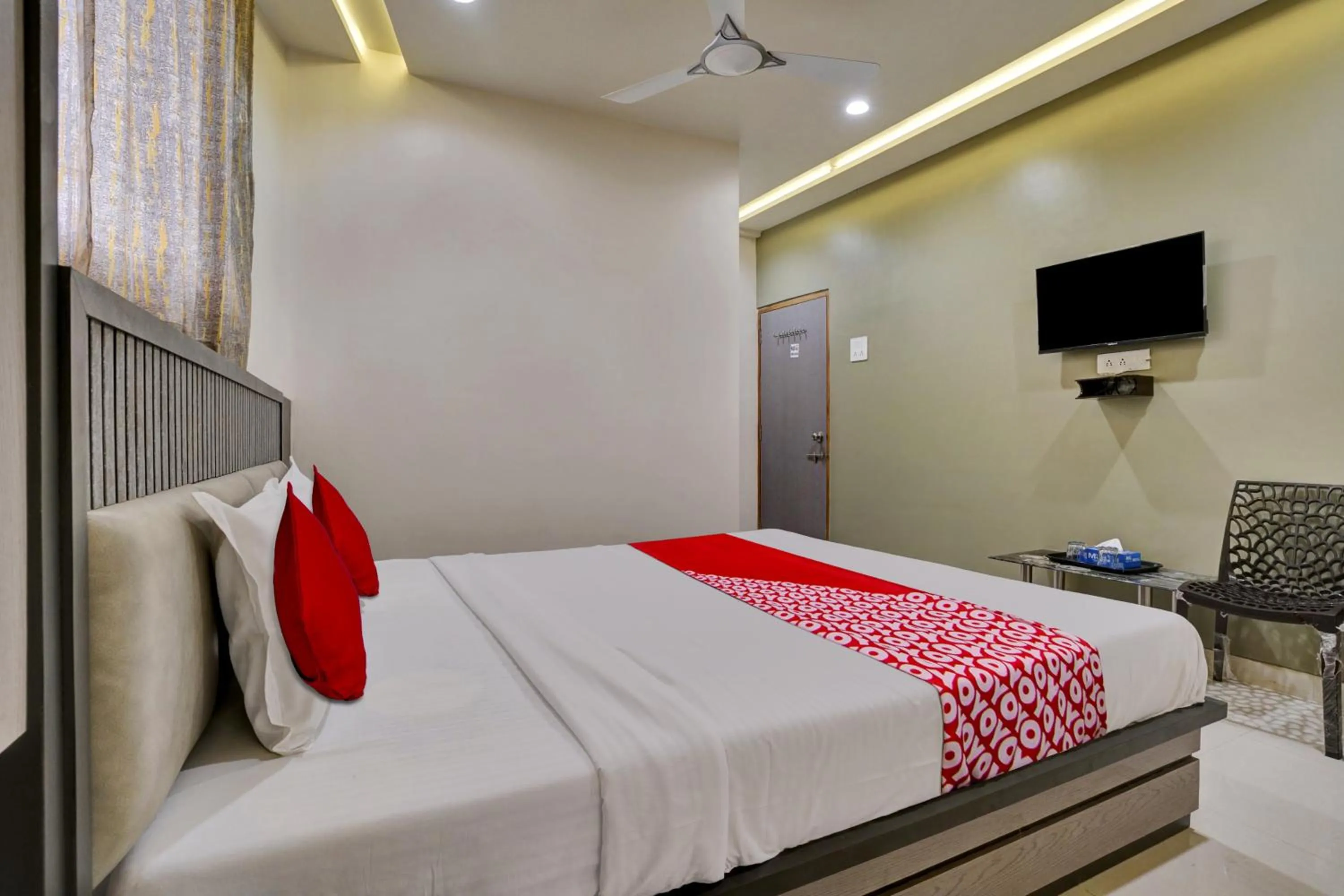 Bedroom in Hotel O Dhiman Residency