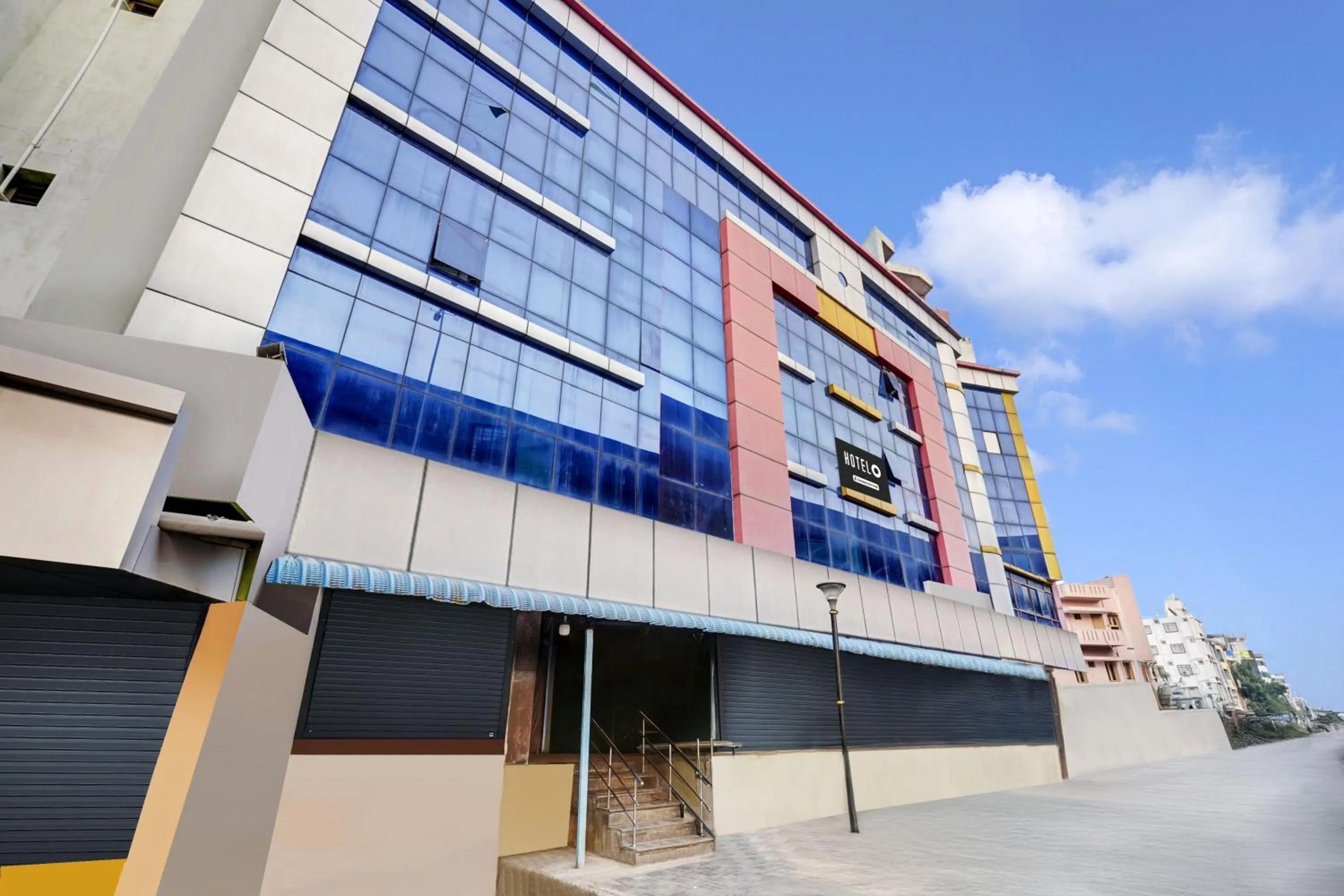 Facade/entrance in Super Hotel O Padmavathi Puram Near Railway Station
