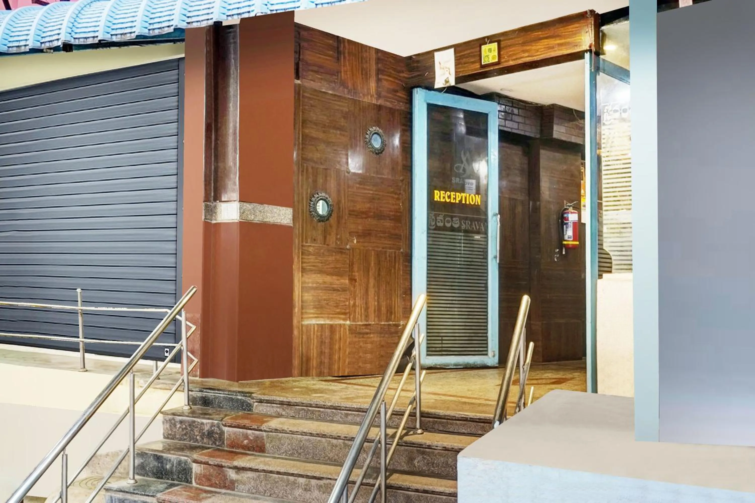 Facade/entrance in Super Hotel O Padmavathi Puram Near Railway Station