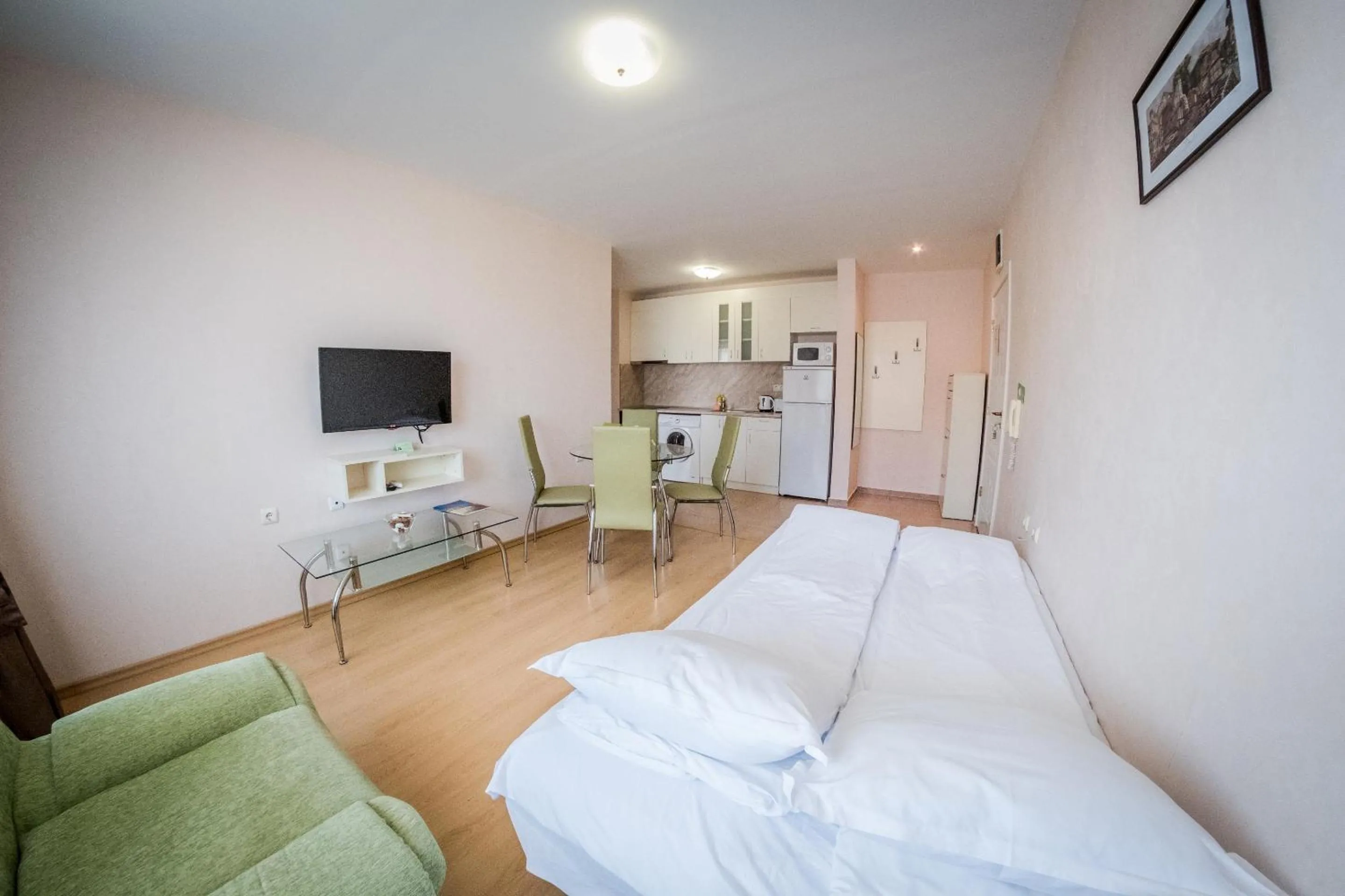 Living room, Bed in Prestige Sands Resort