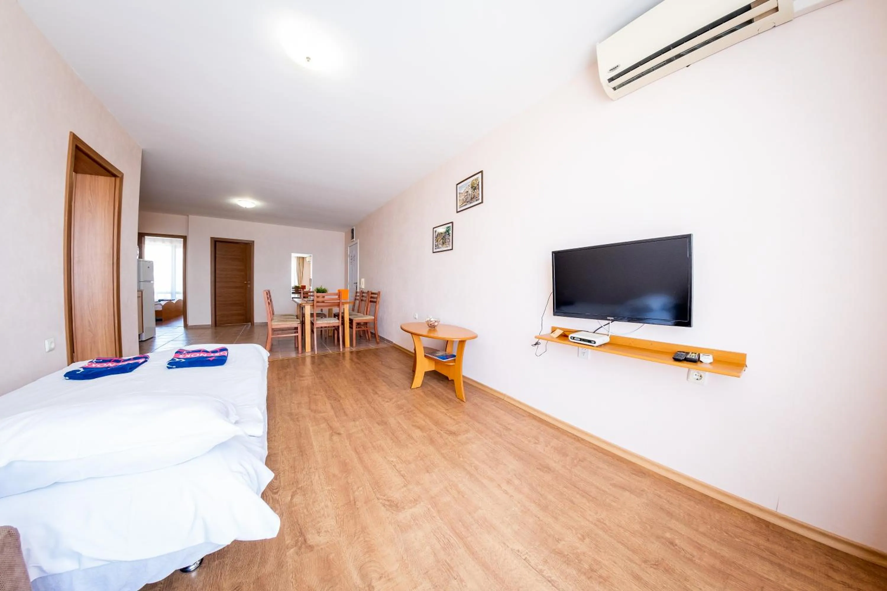 Living room, Bed in Prestige Sands Resort