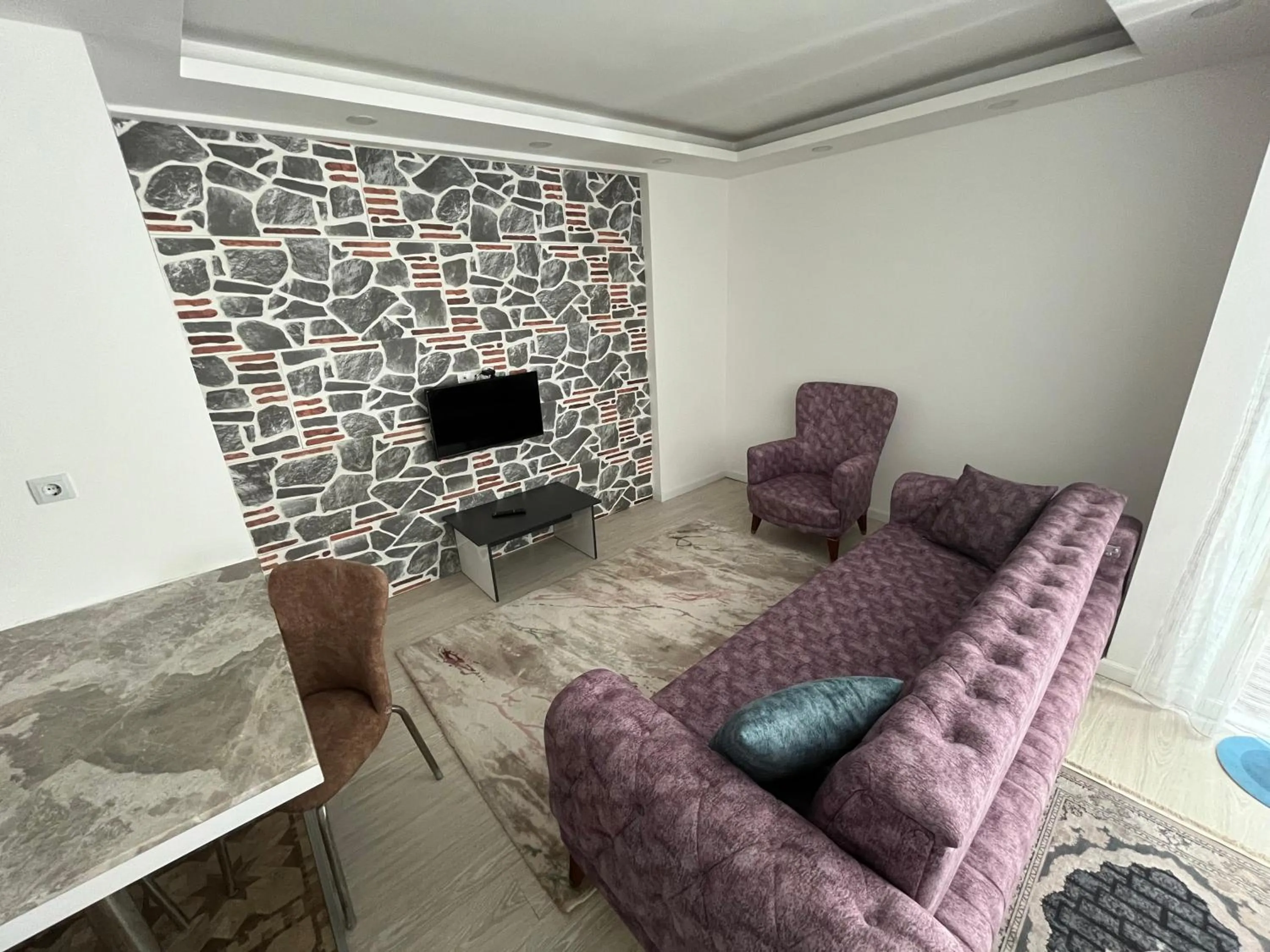 TV and multimedia in Gardenya Lara Suit Hotel