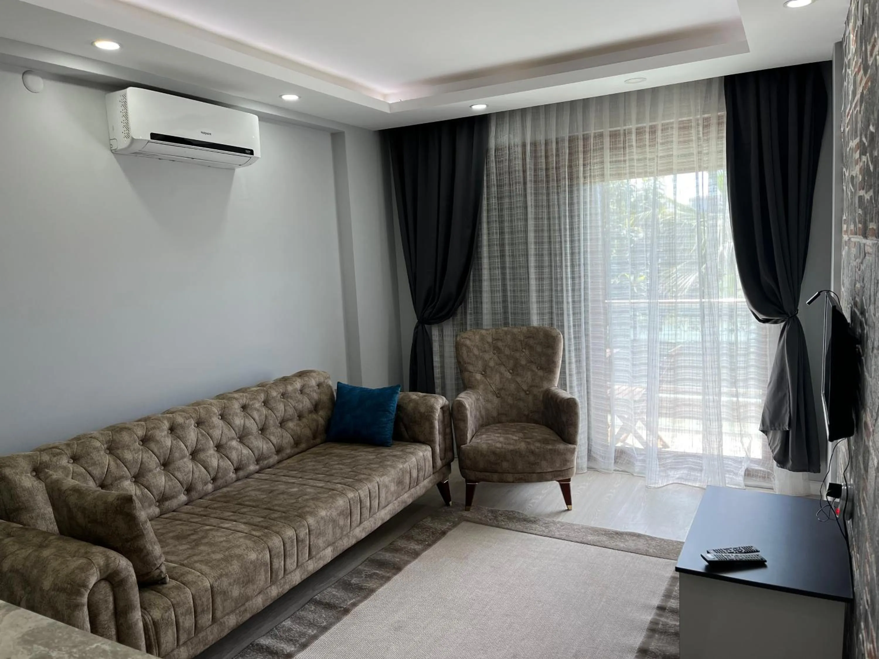 TV and multimedia in Gardenya Lara Suit Hotel