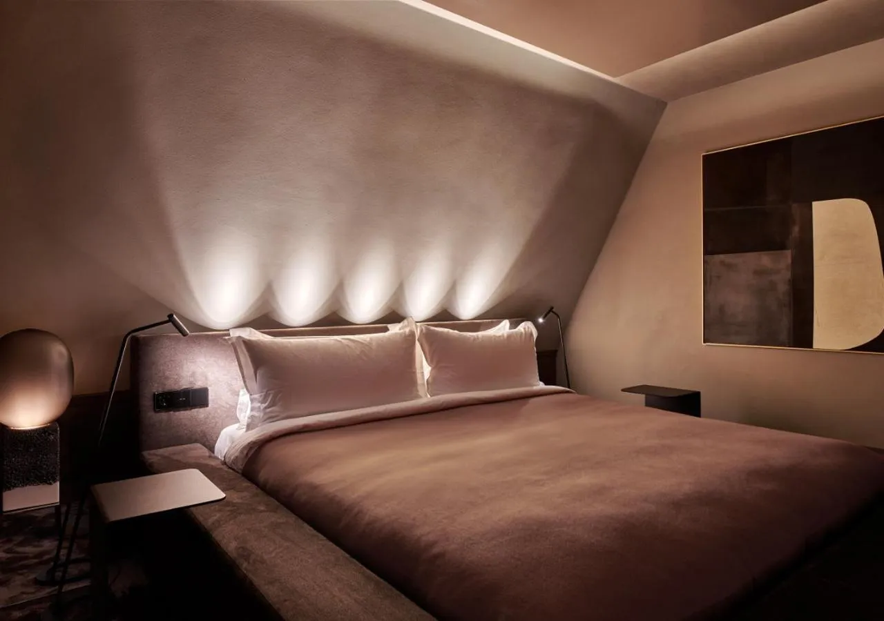 Bed in De L’Europe Amsterdam – The Leading Hotels of the World