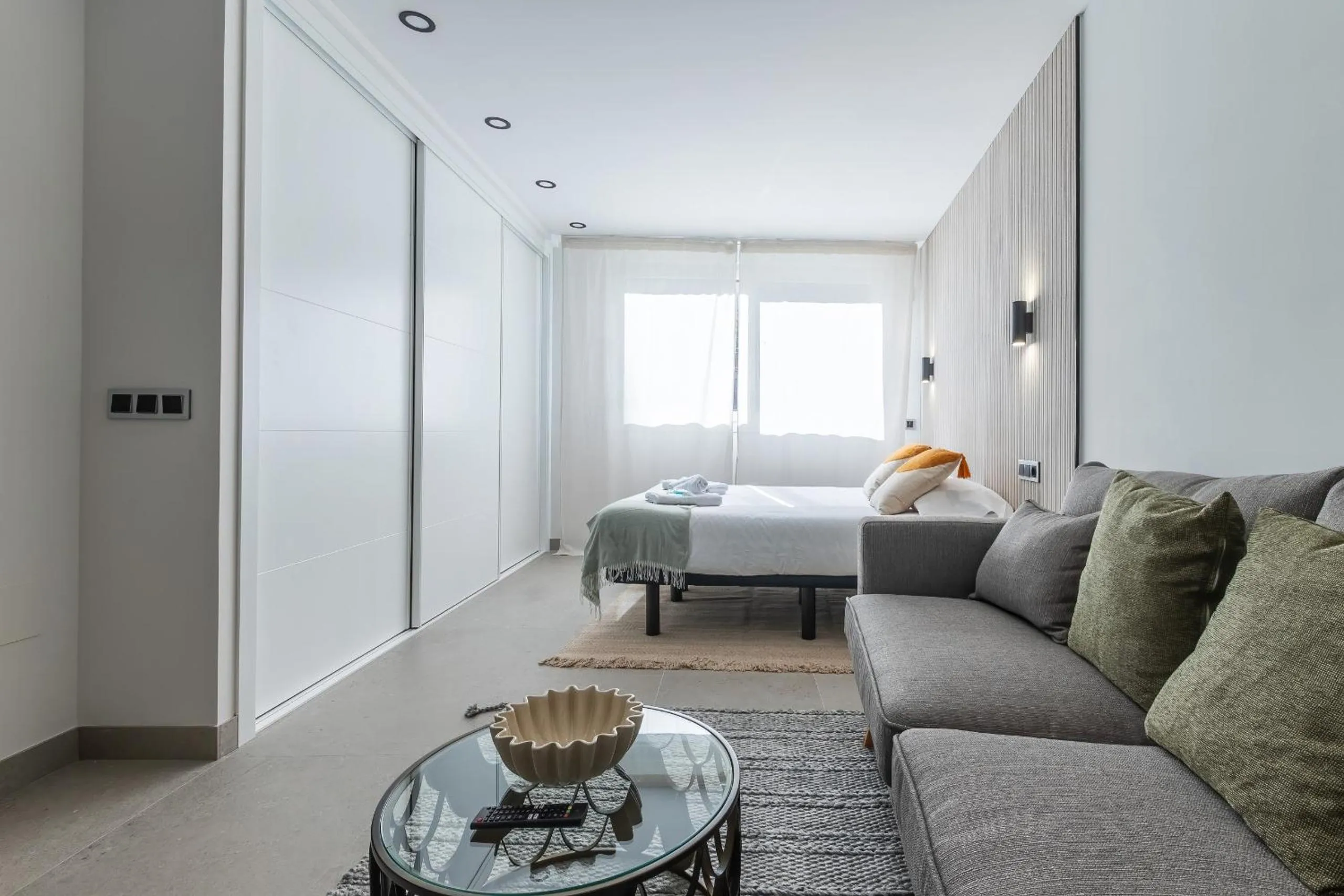 Bed in Housing Muelle Uno by SharingCo
