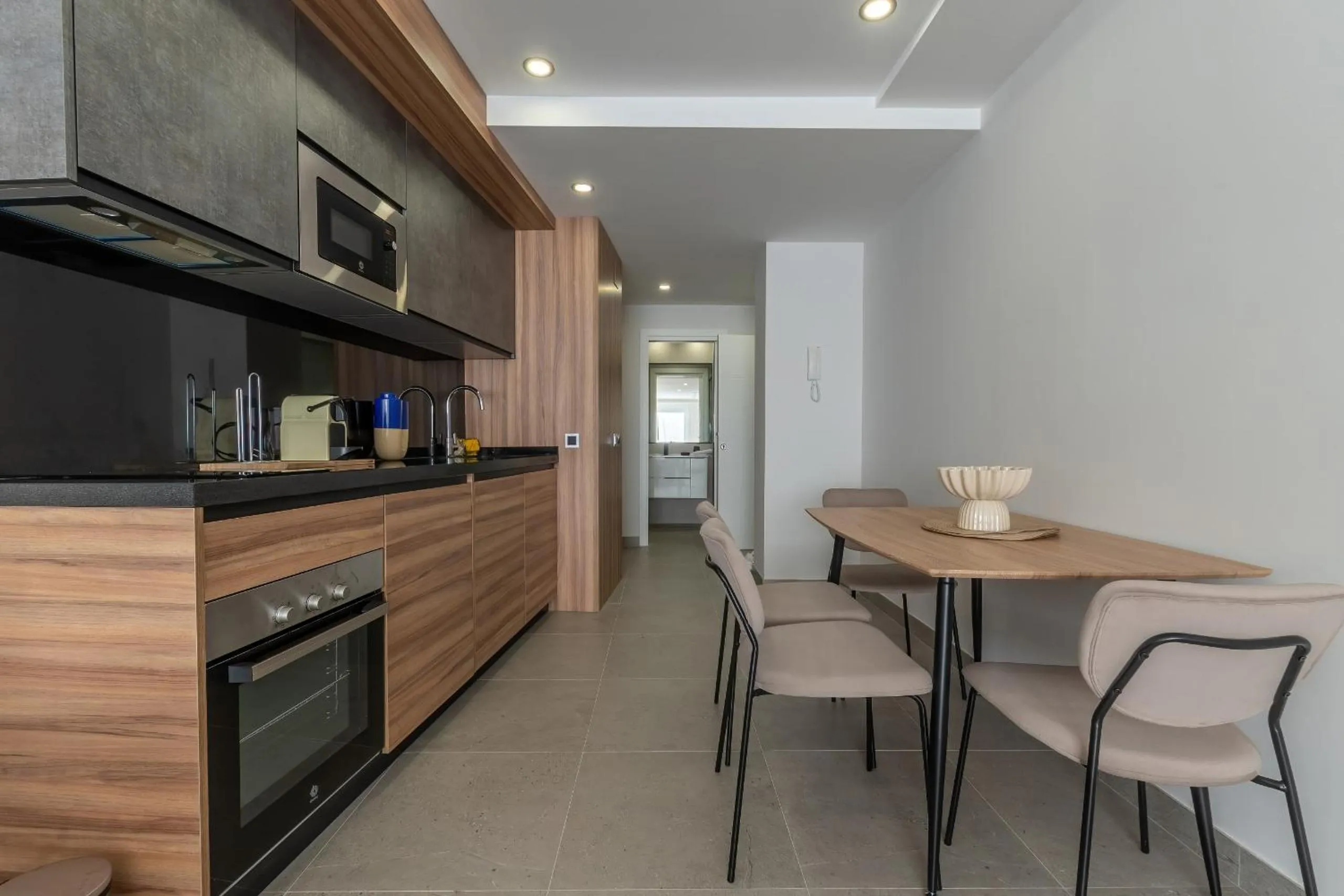 Dining area in Housing Muelle Uno by SharingCo