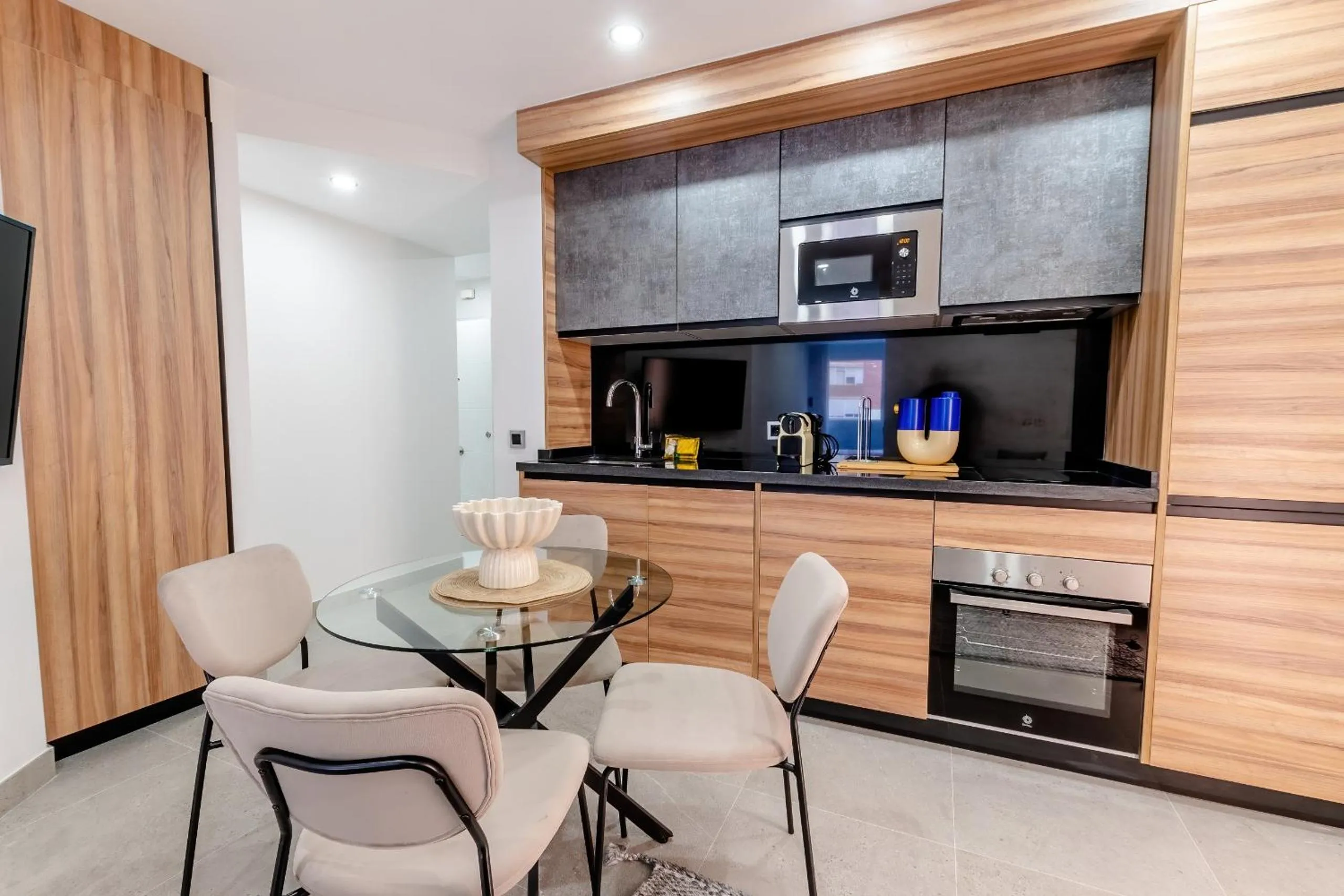 Dining area in Housing Muelle Uno by SharingCo