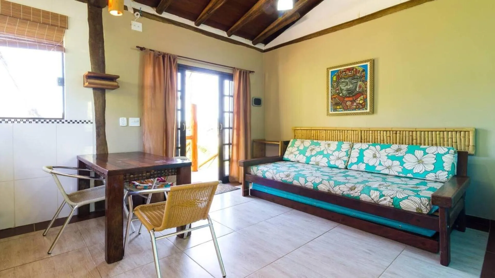 Living room, Bed in Chalés Yababali Lagoinha