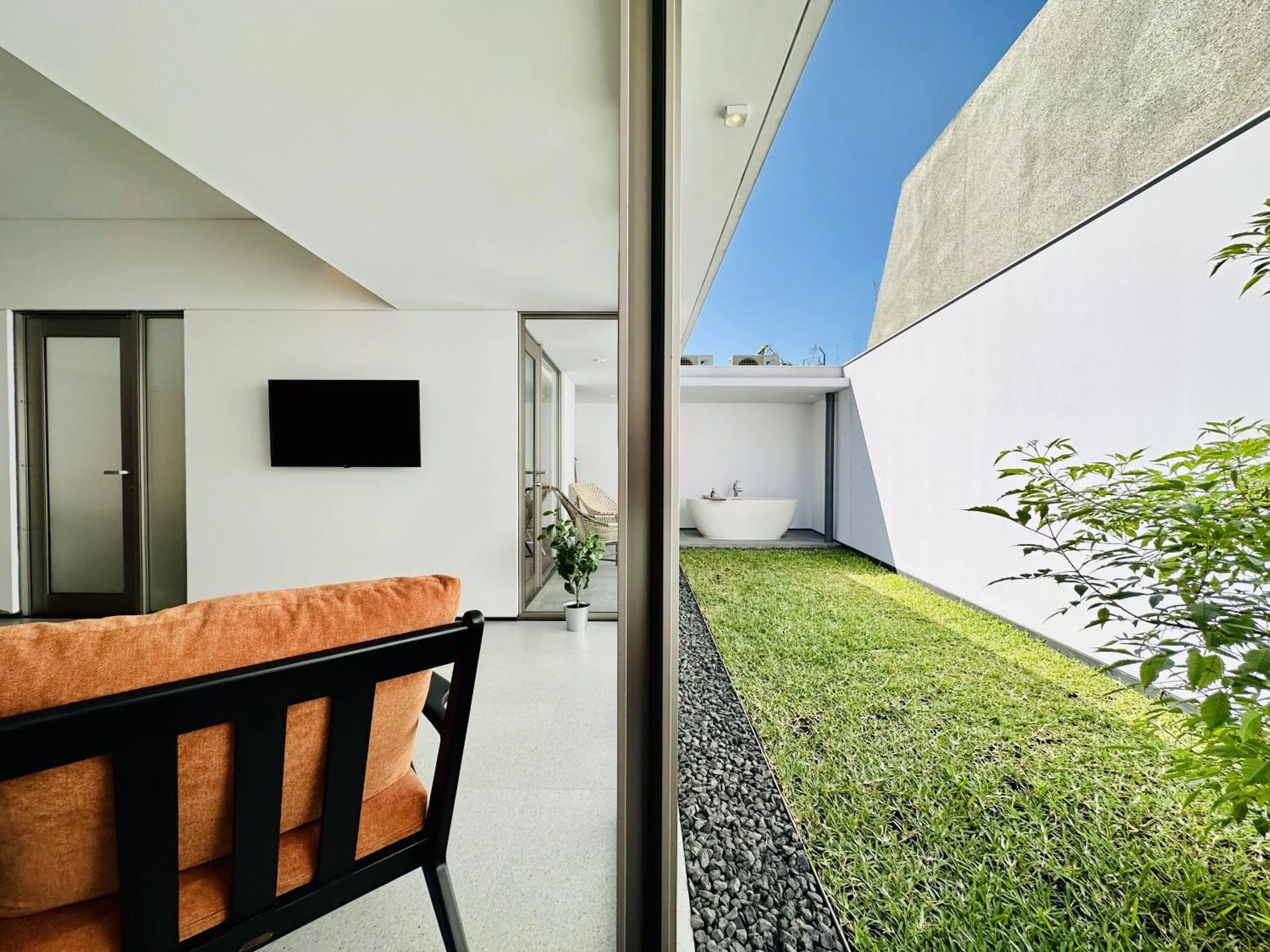 Communal lounge/ TV room in Bungalow Homes