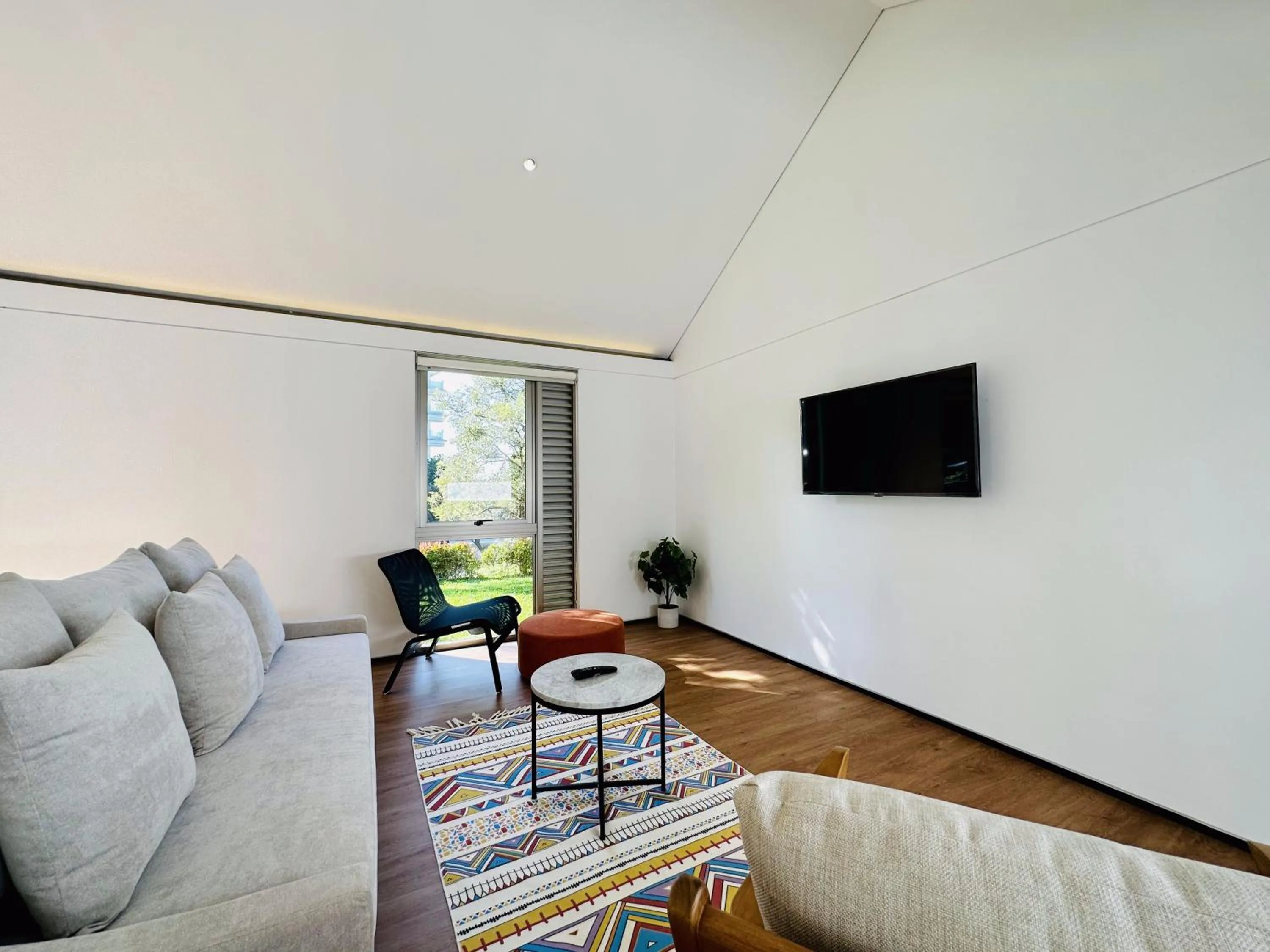 Communal lounge/ TV room in Bungalow Homes