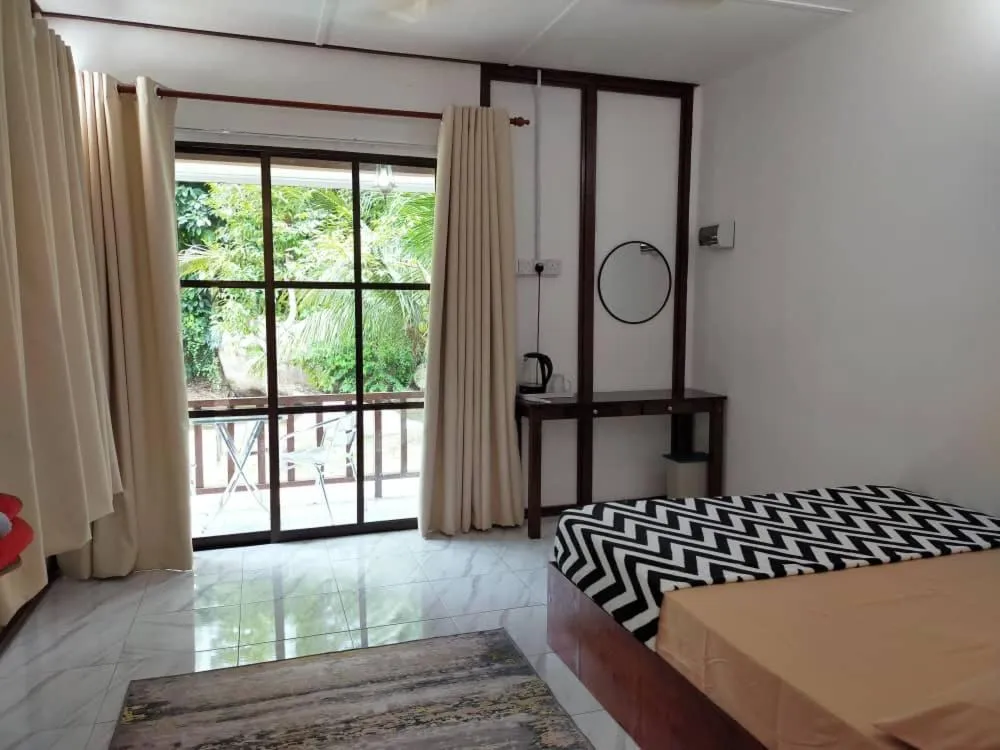 Bed in D'Impiana Riverview Chalet # Lenggong