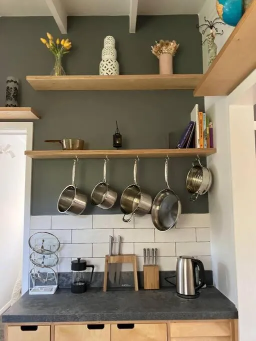 Kitchen or kitchenette in Sunflower House, a cozy cabin at Lake Wentworth