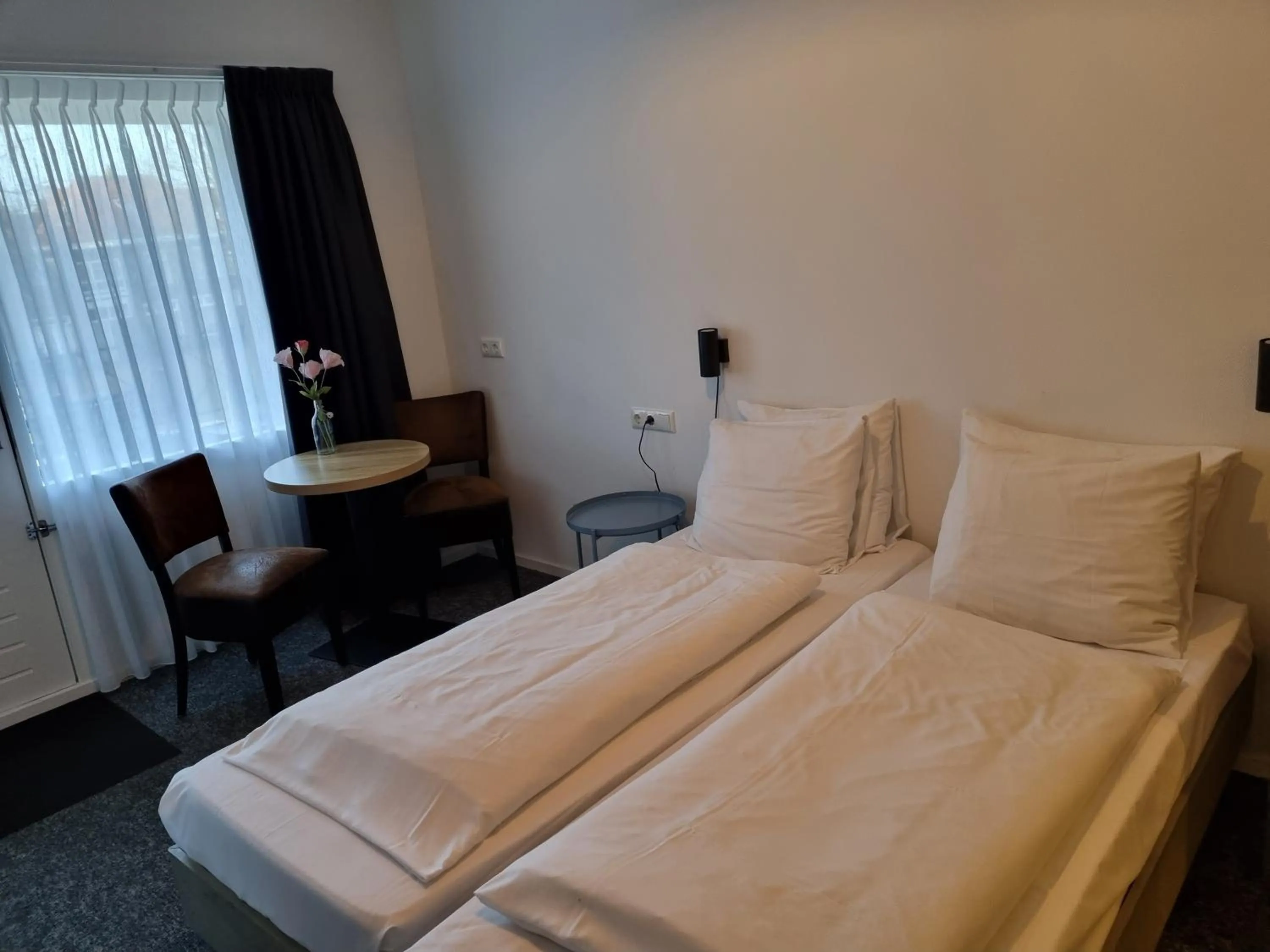 Photo of the whole room, Bed in Hotel Restaurant De Stadsherberg