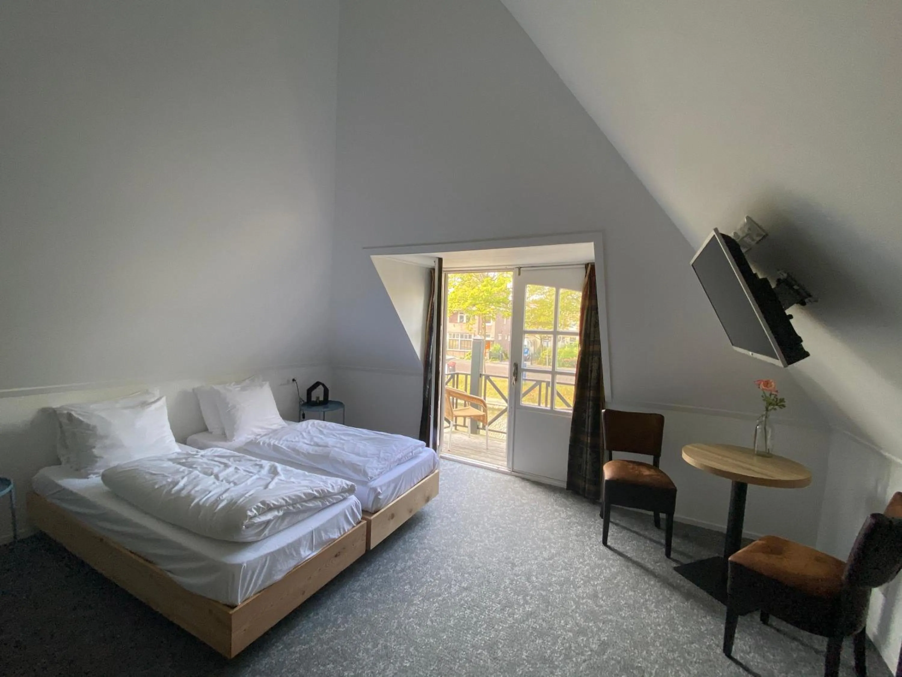 Photo of the whole room, Bed in Hotel Restaurant De Stadsherberg