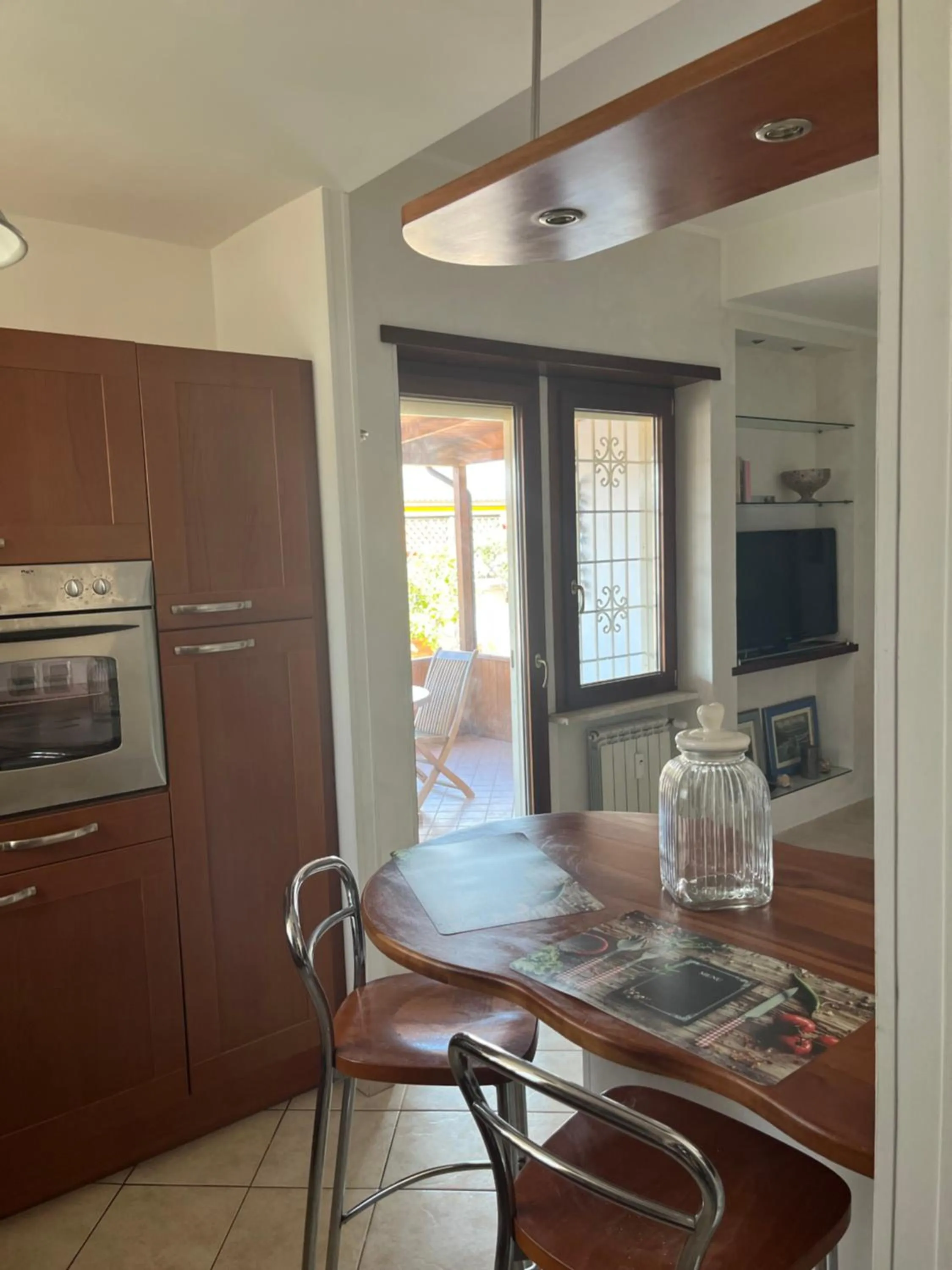 Kitchen or kitchenette in Attico con terrazza in Via dei Traghetti