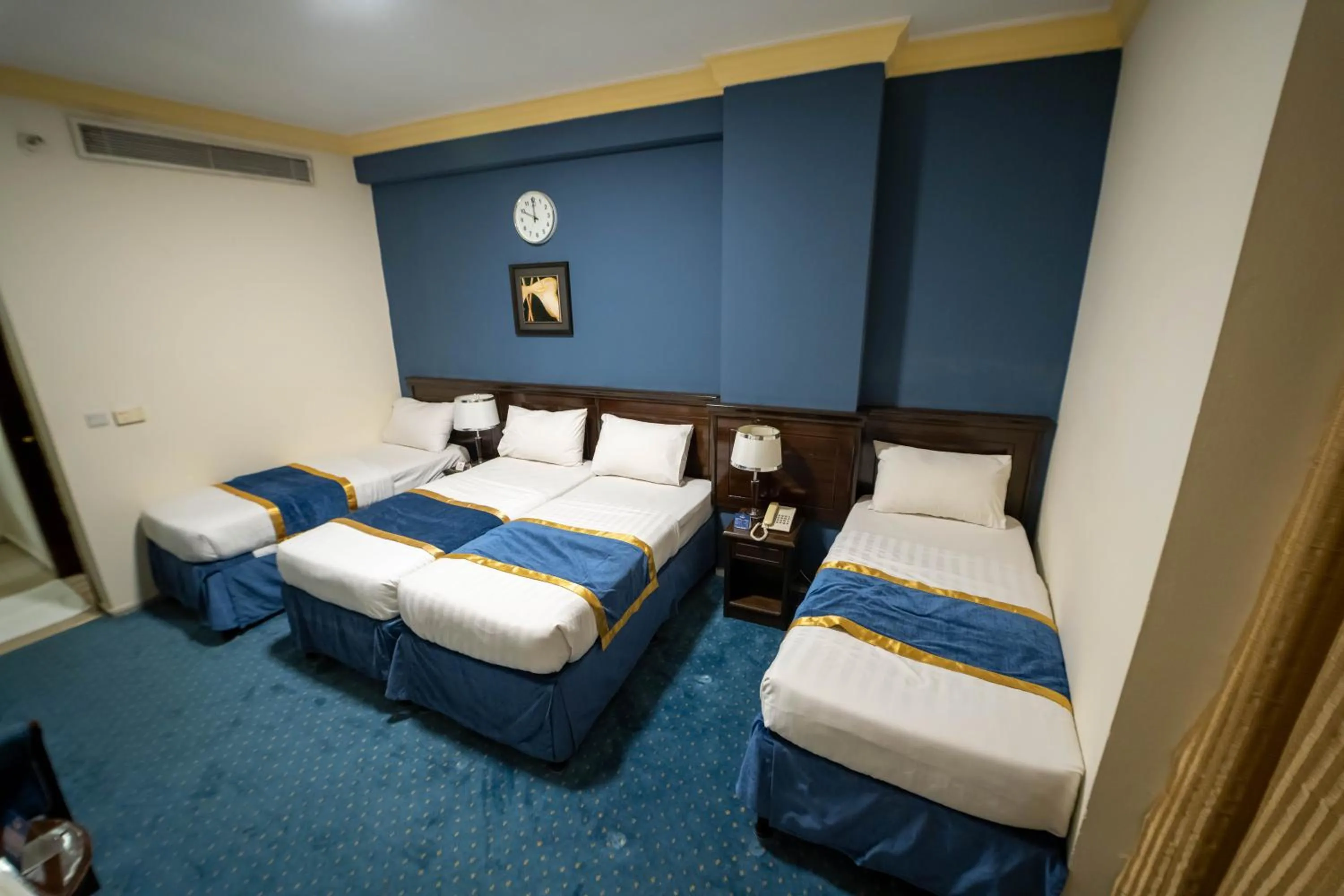 Bedroom in Al Barakah Mawaddah Hotel