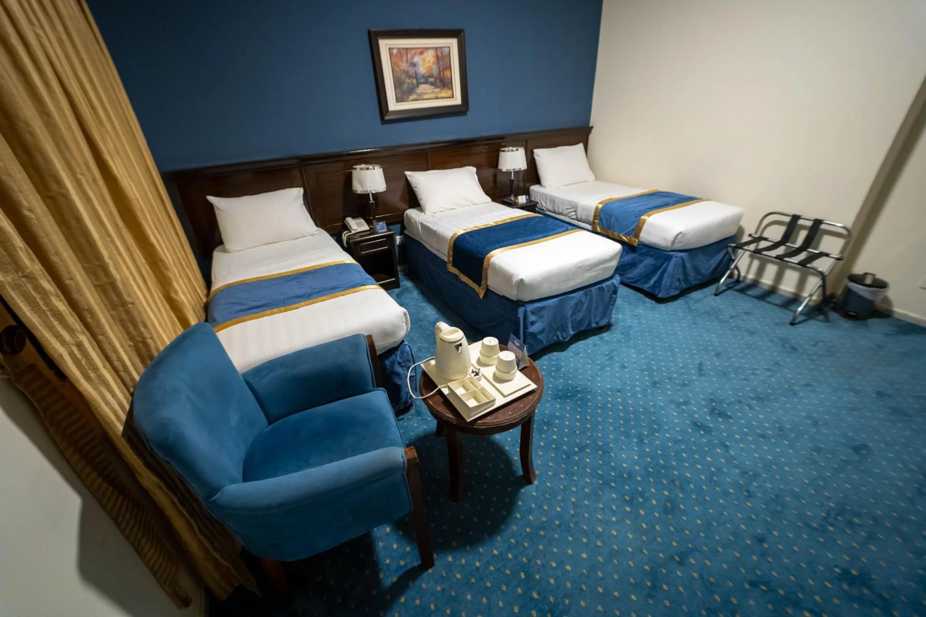 Bedroom in Al Barakah Mawaddah Hotel