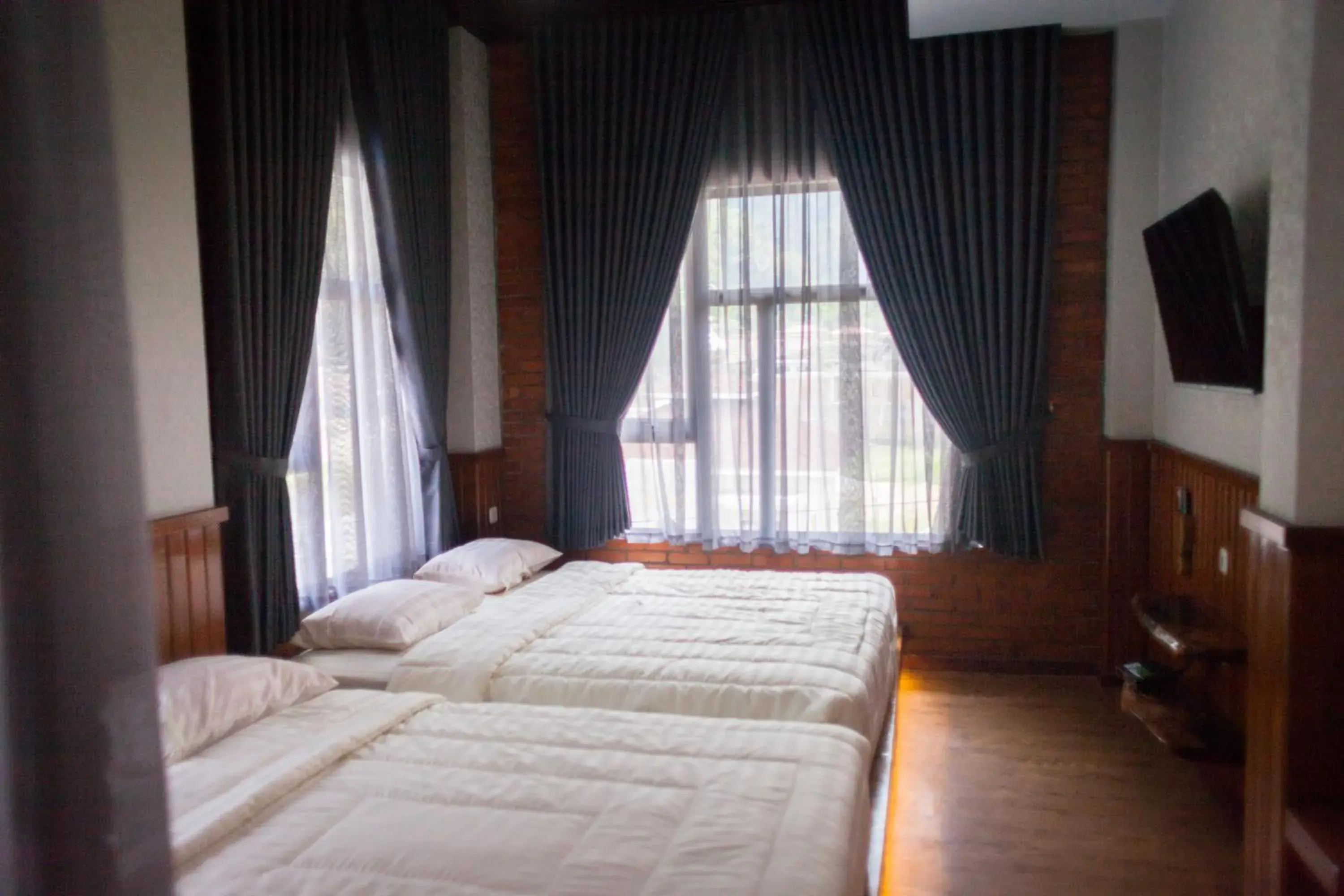 Bed in Pariban Hotel Bed in Pariban Hotel