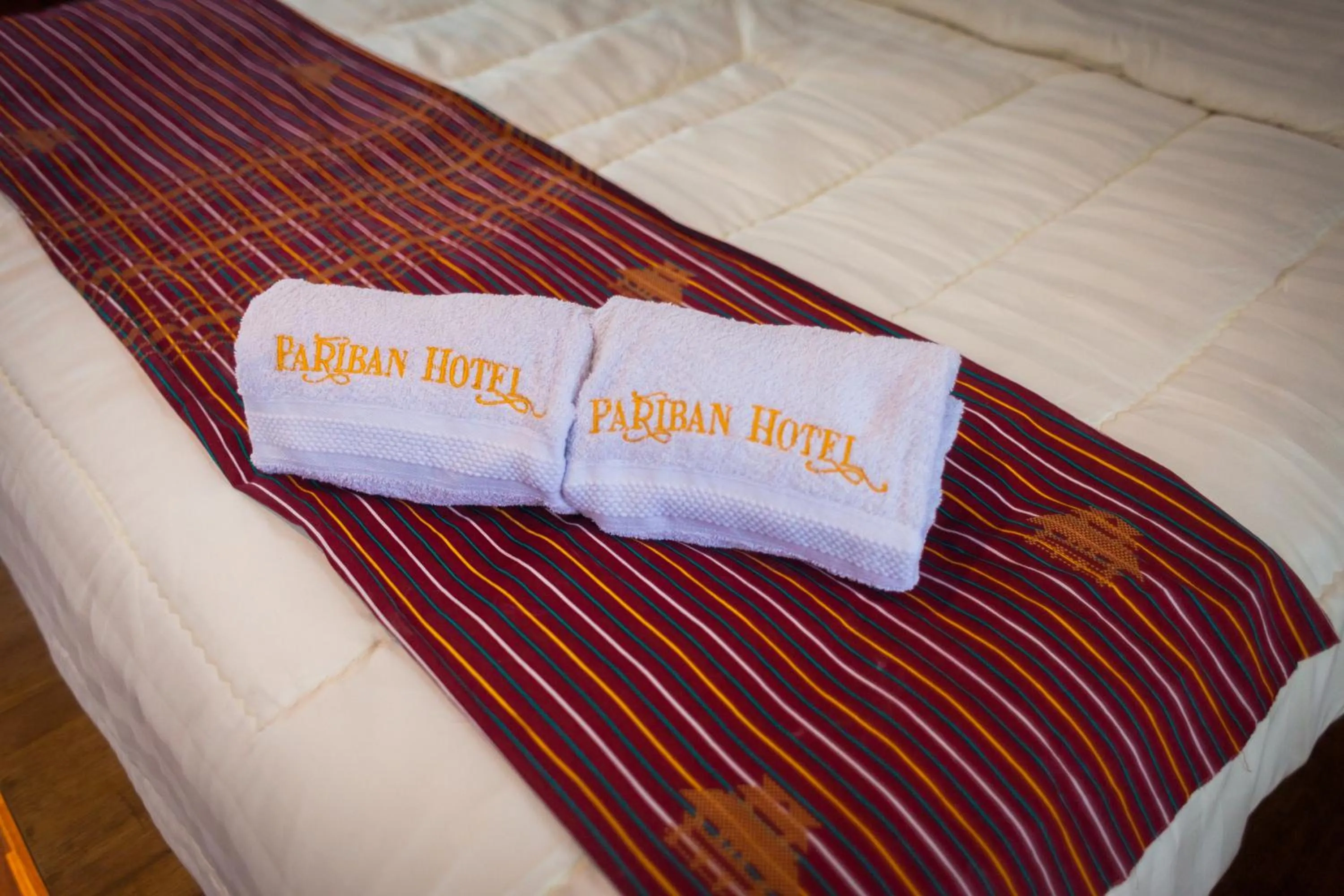 Bed in Pariban Hotel