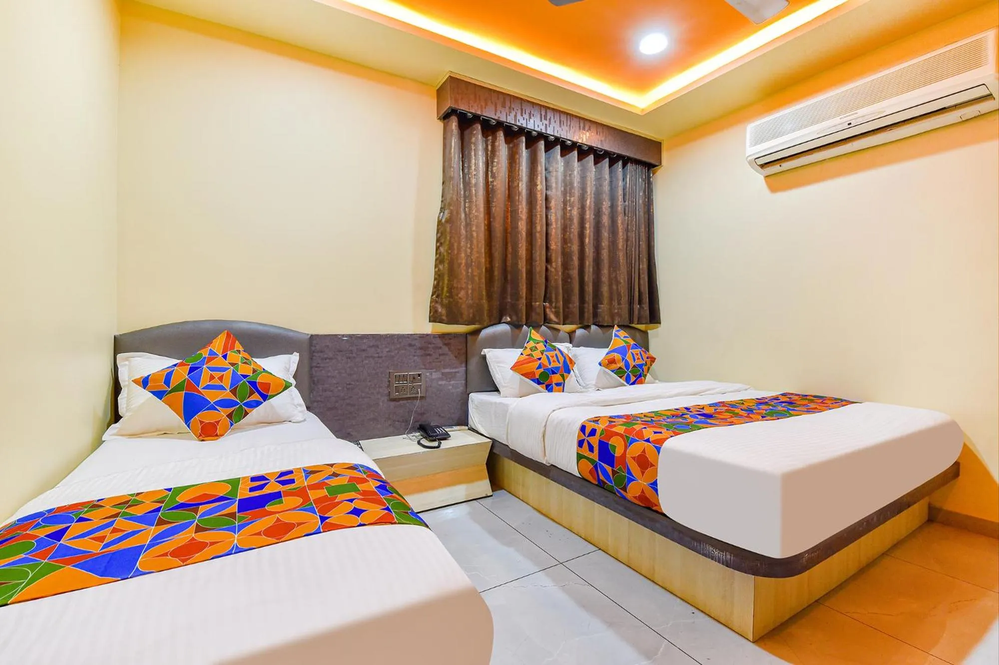 Bed in FabHotel Max Inn - Inside Himalaya Square