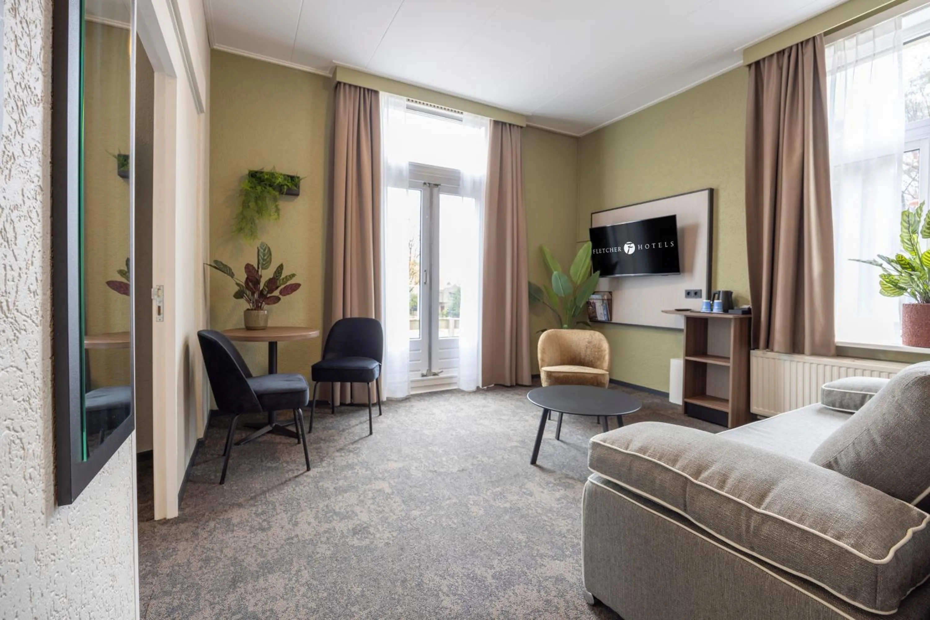 Living room in Fletcher Hotel Apeldoorn