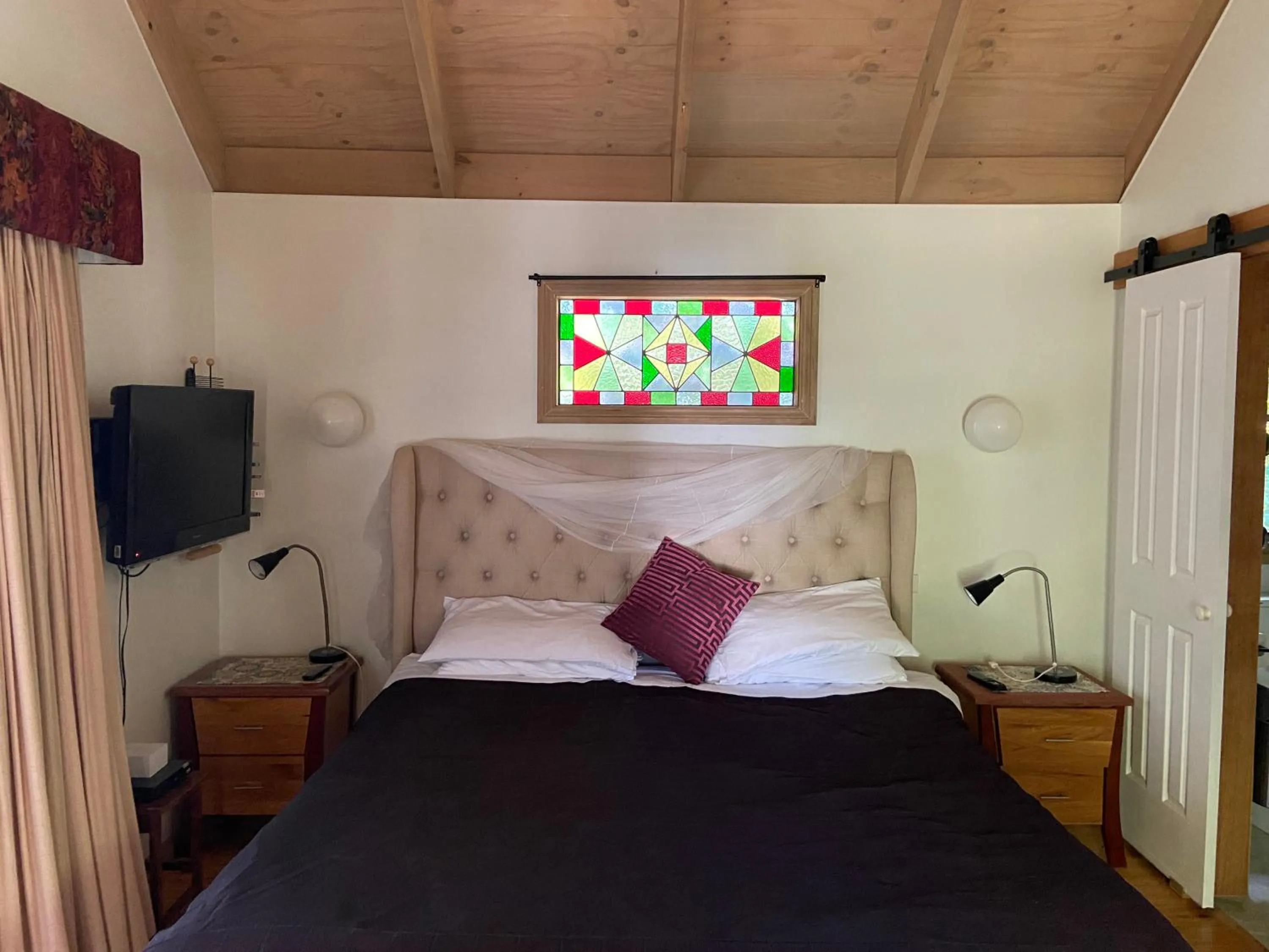 Bed in Olinda Country Cottages