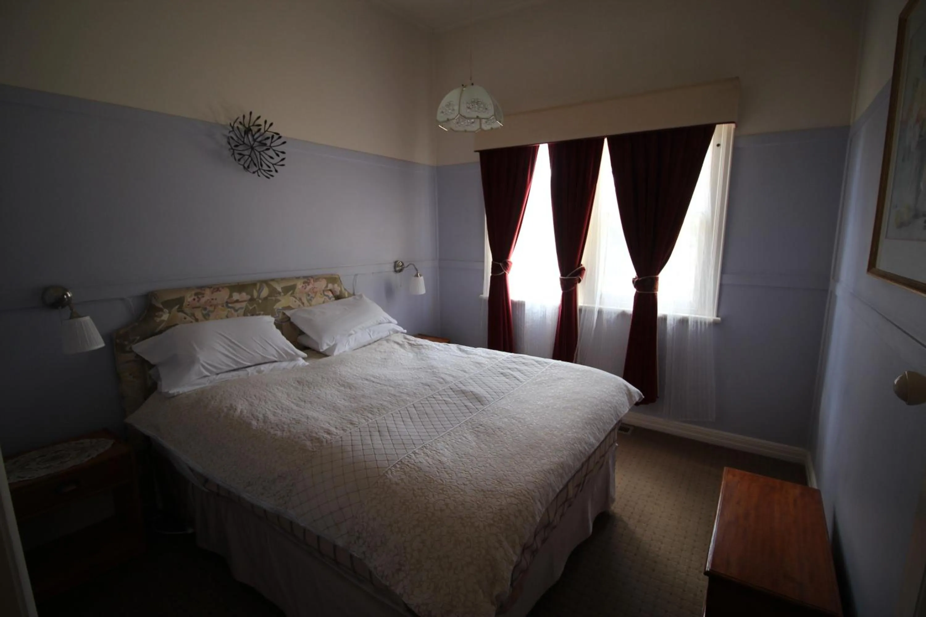 Bed in Olinda Country Cottages